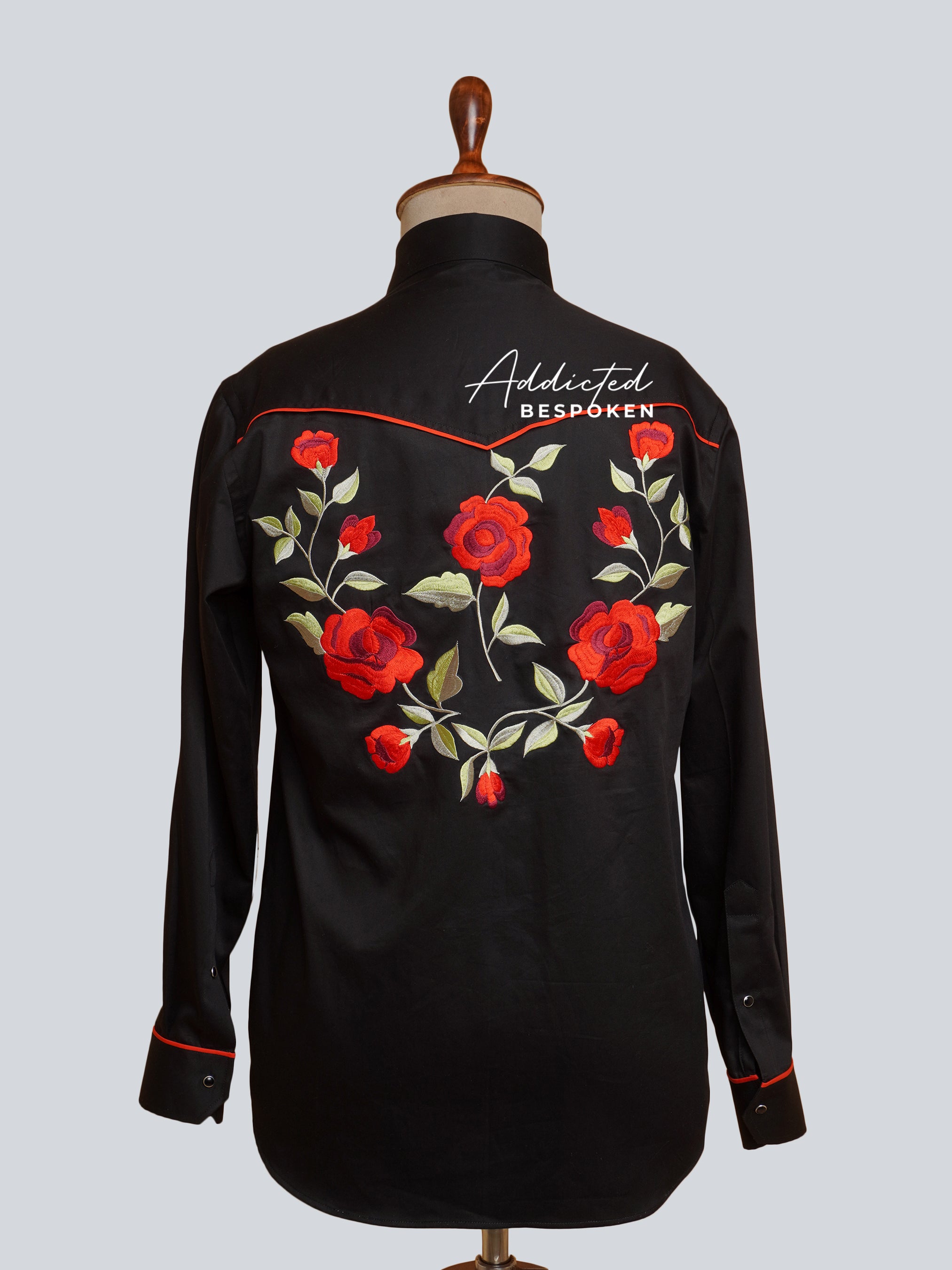 Back view of black embroidered western shirt with large red floral motifs – Addicted Bespoken