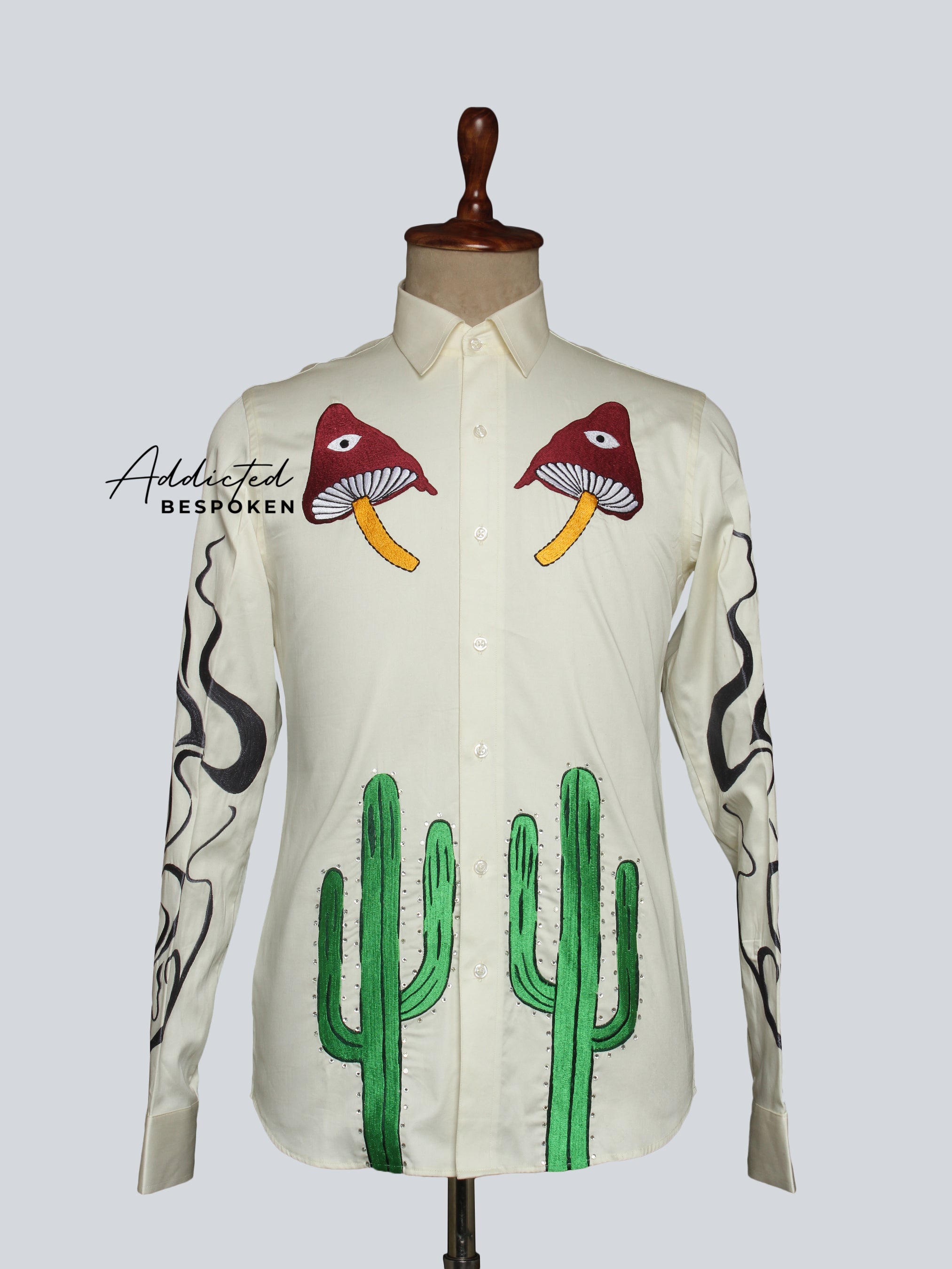 Front view of cream western shirt with green cactus embroidery and red bird motifs – Addicted Bespoken