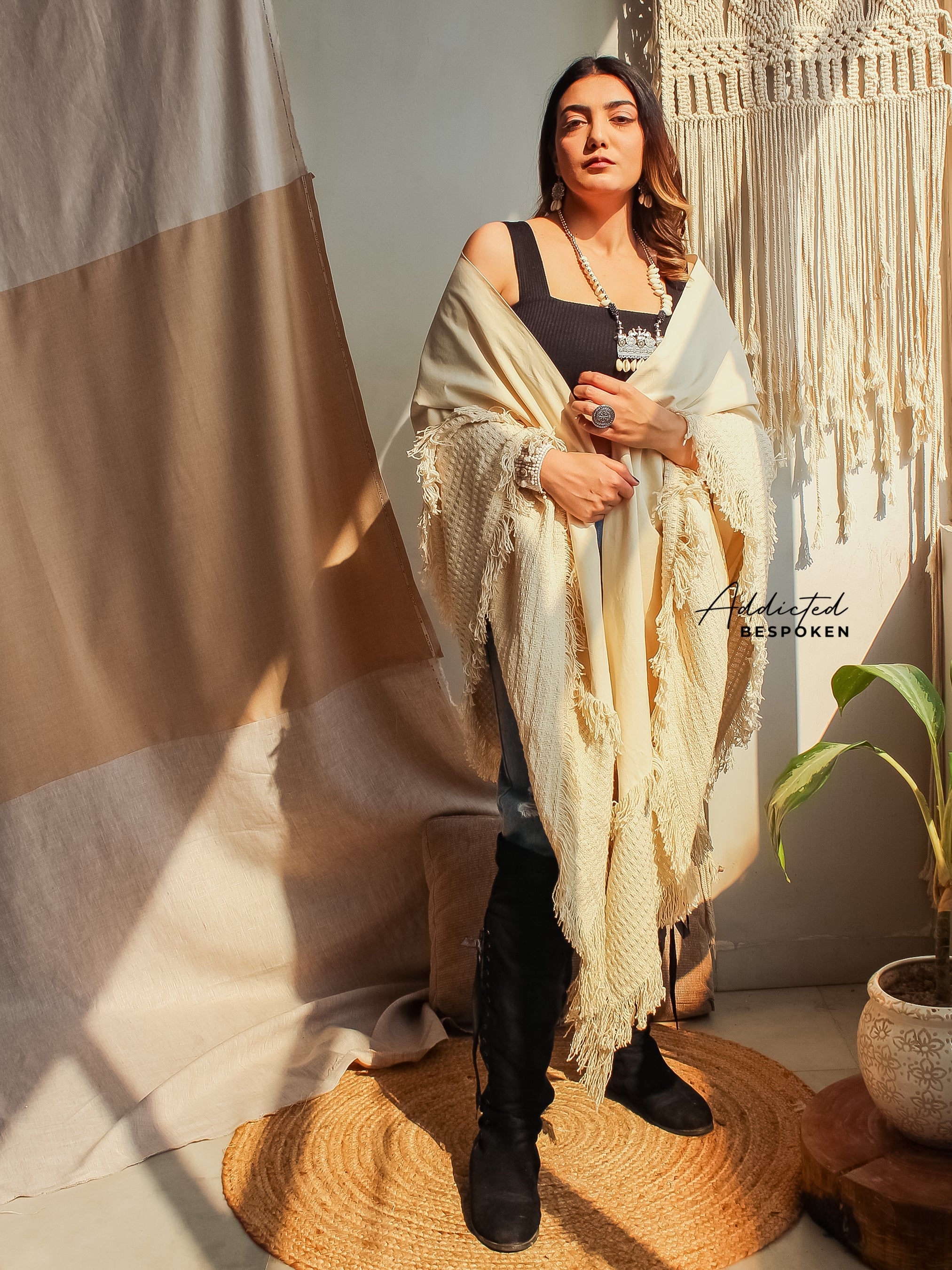Woman posing in Tribal Boho Fringes Shawl with boots – festival-ready boho chic outfit