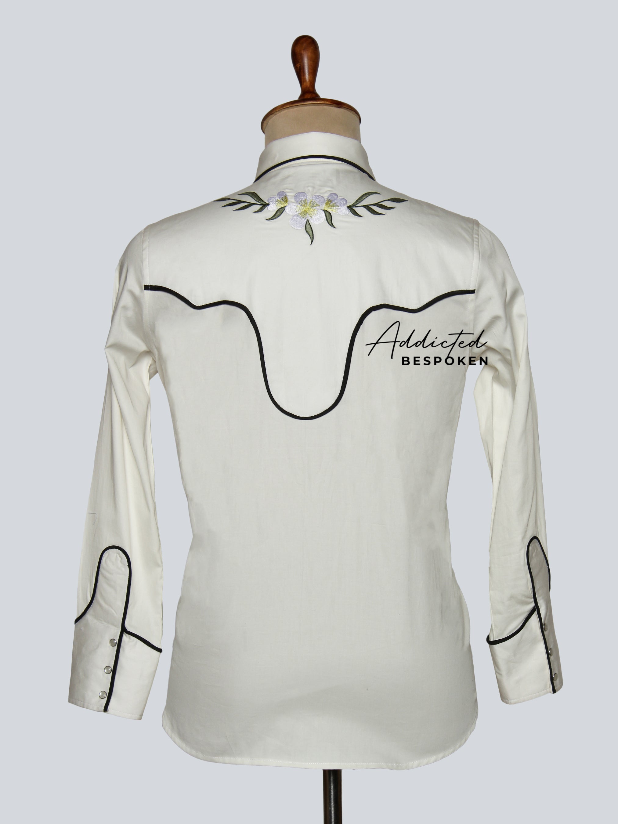 Back view of white western shirt with floral embroidery and yoke detailing – Addicted Bespoken