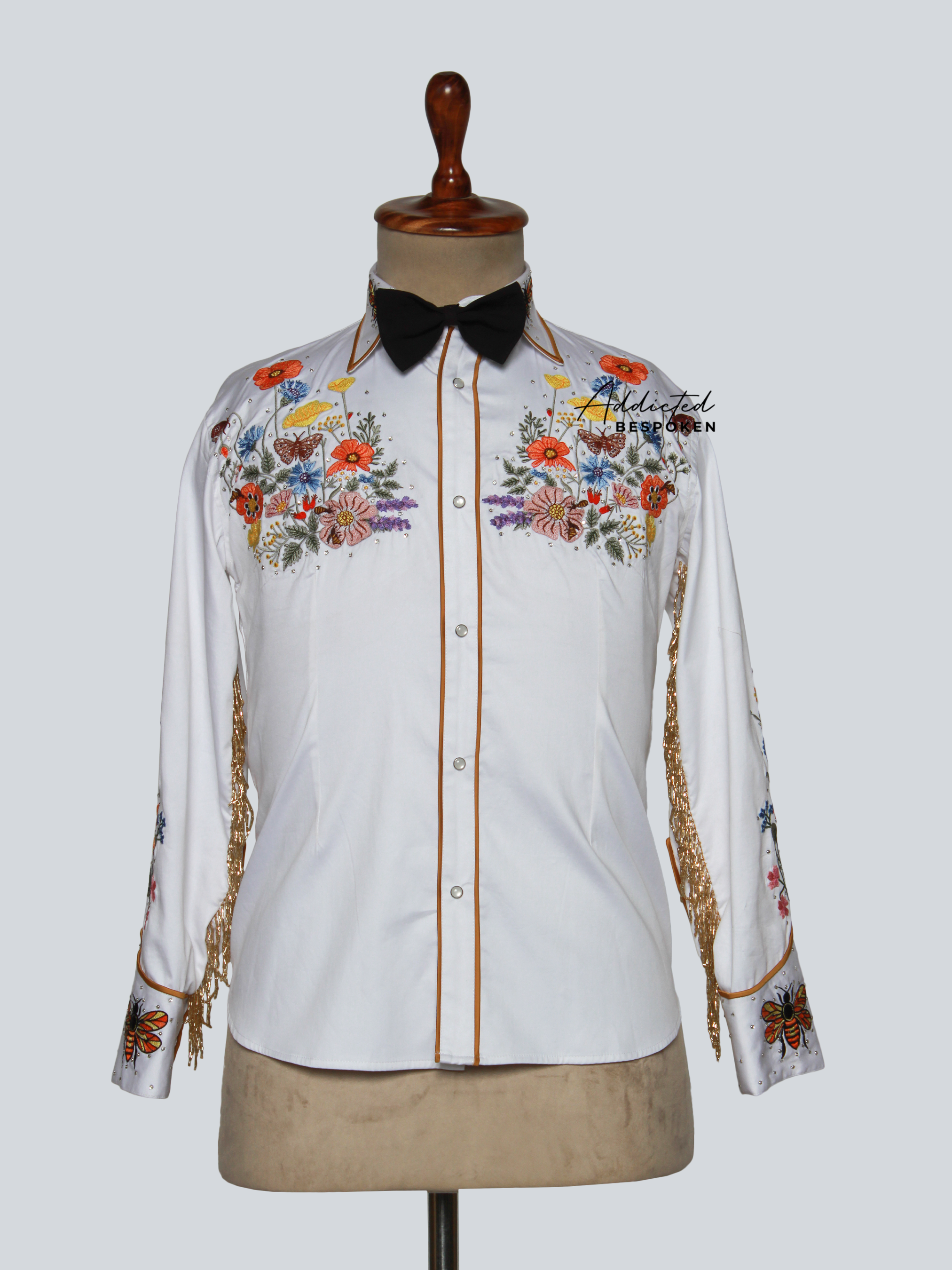 Front view of white western shirt with colorful floral embroidery on chest and shoulders – Addicted Bespoken