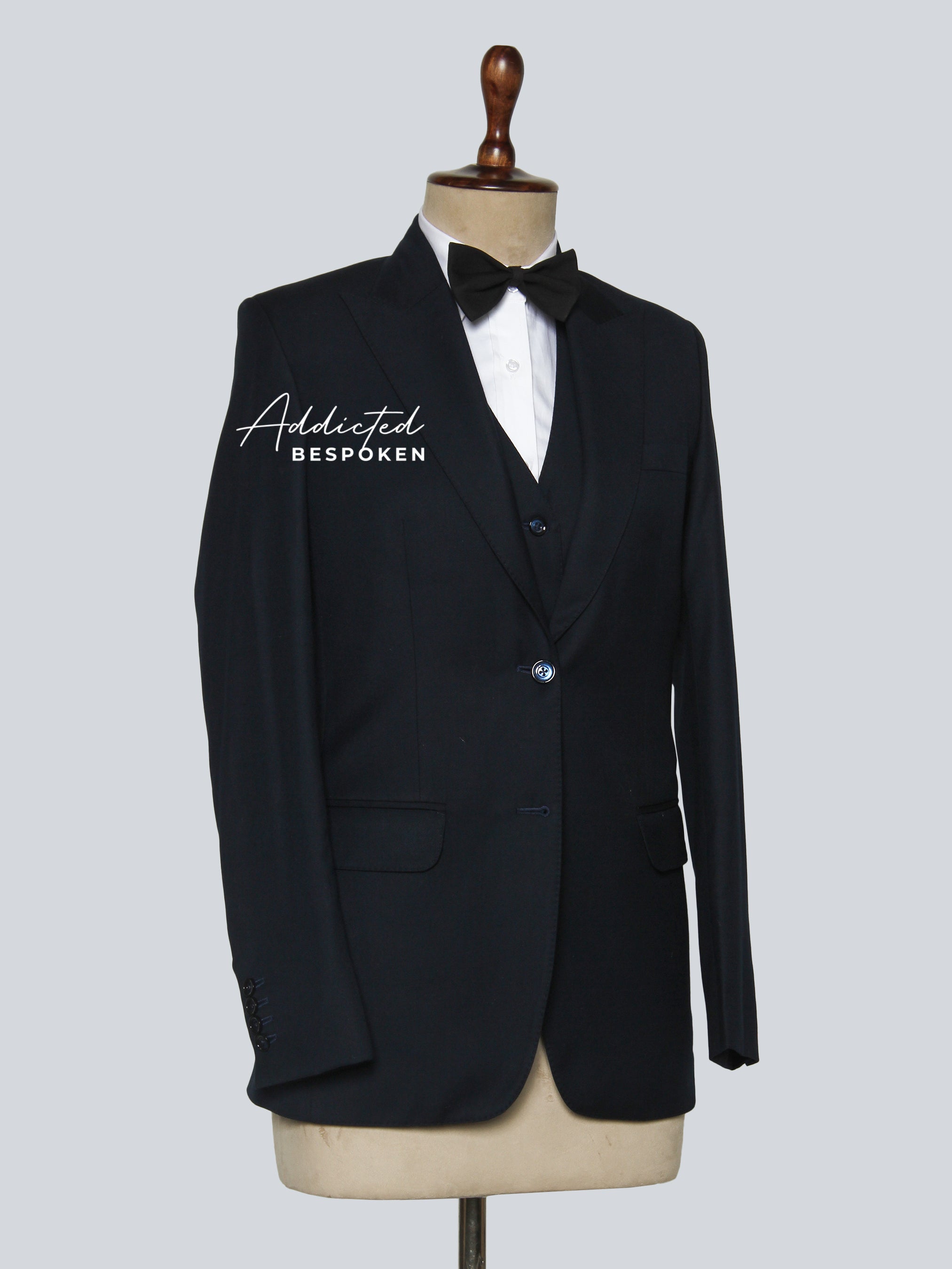 Signature classic formal suit side view – men’s tailored black suit with slim fit silhouette and sharp lapel