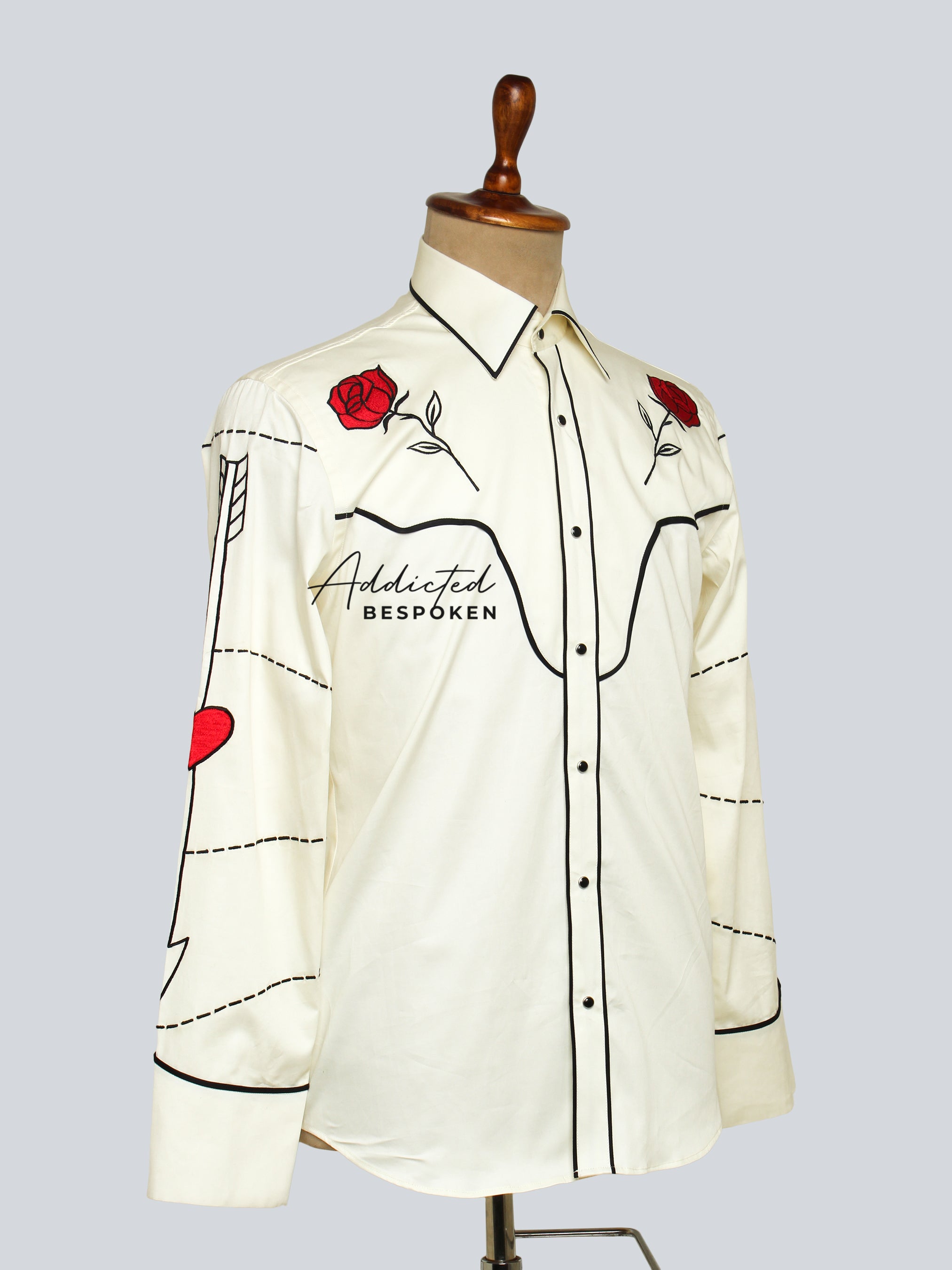 Angled side view of cream western shirt with floral embroidery on shoulders โ Addicted Bespoken