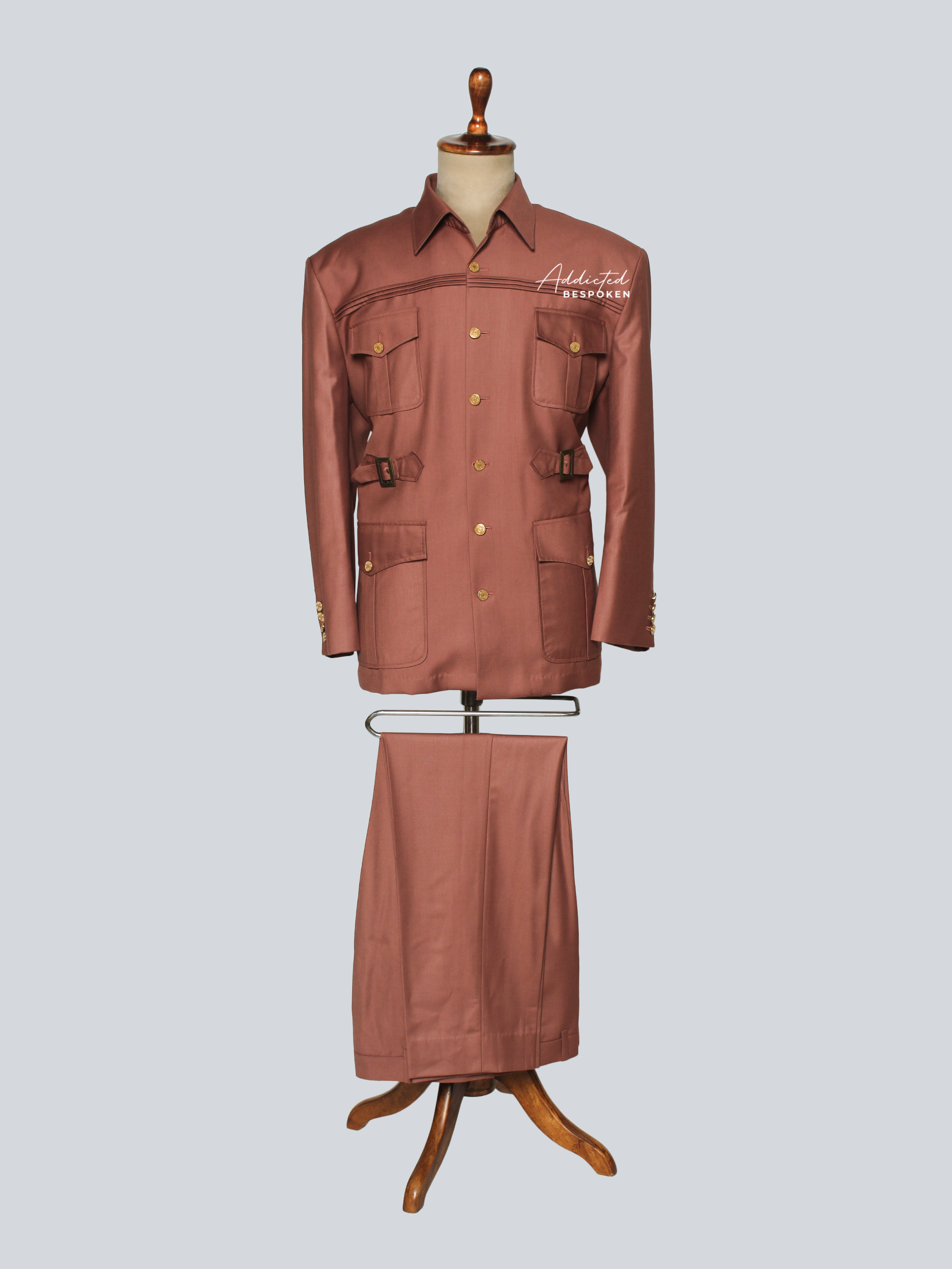 Menโs full iconic safari suit โ bespoke brown safari jacket with four pockets and matching trousers