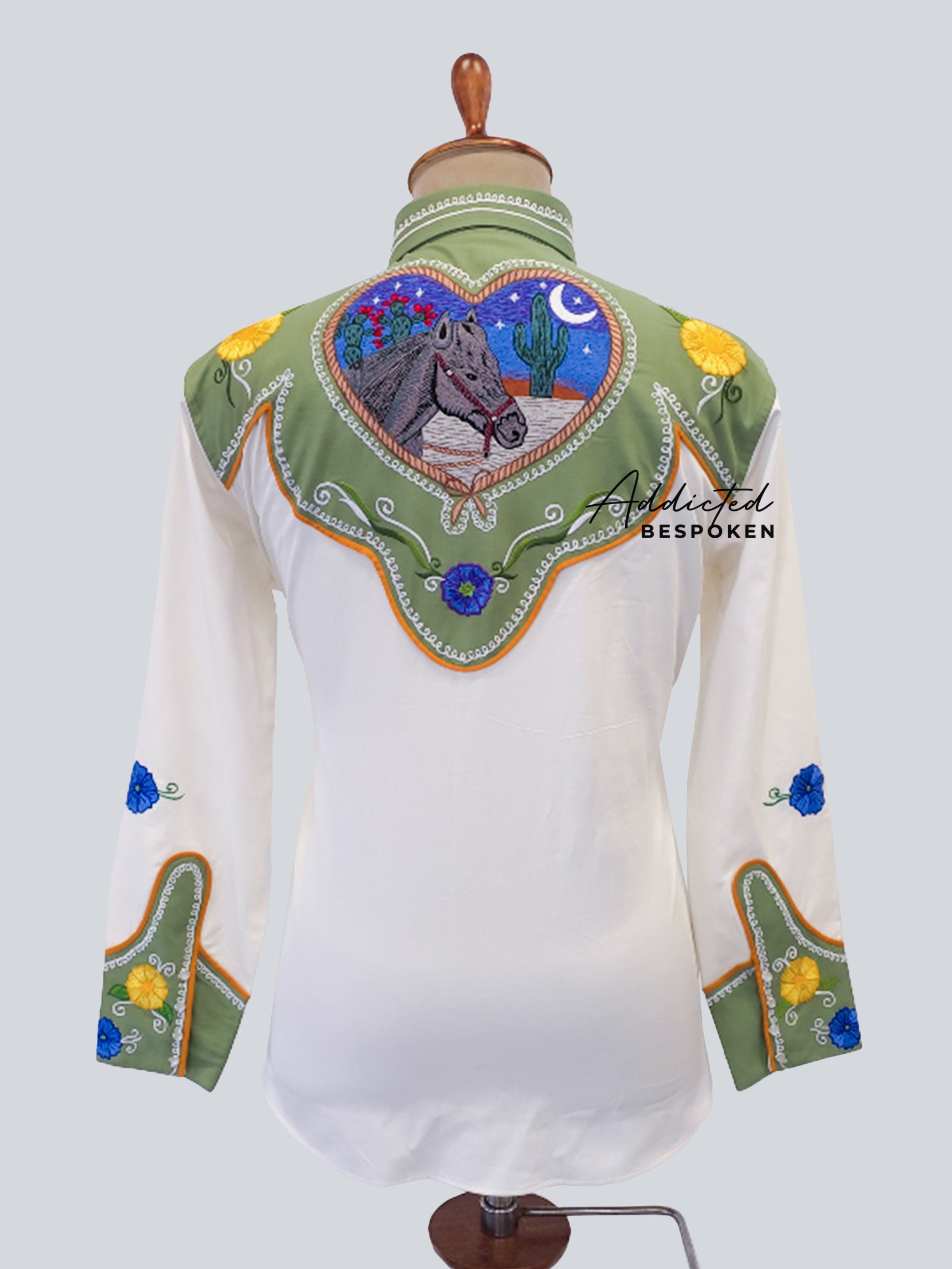 Back view of white western shirt with green yoke and multicolor embroidered floral design – Addicted Bespoken