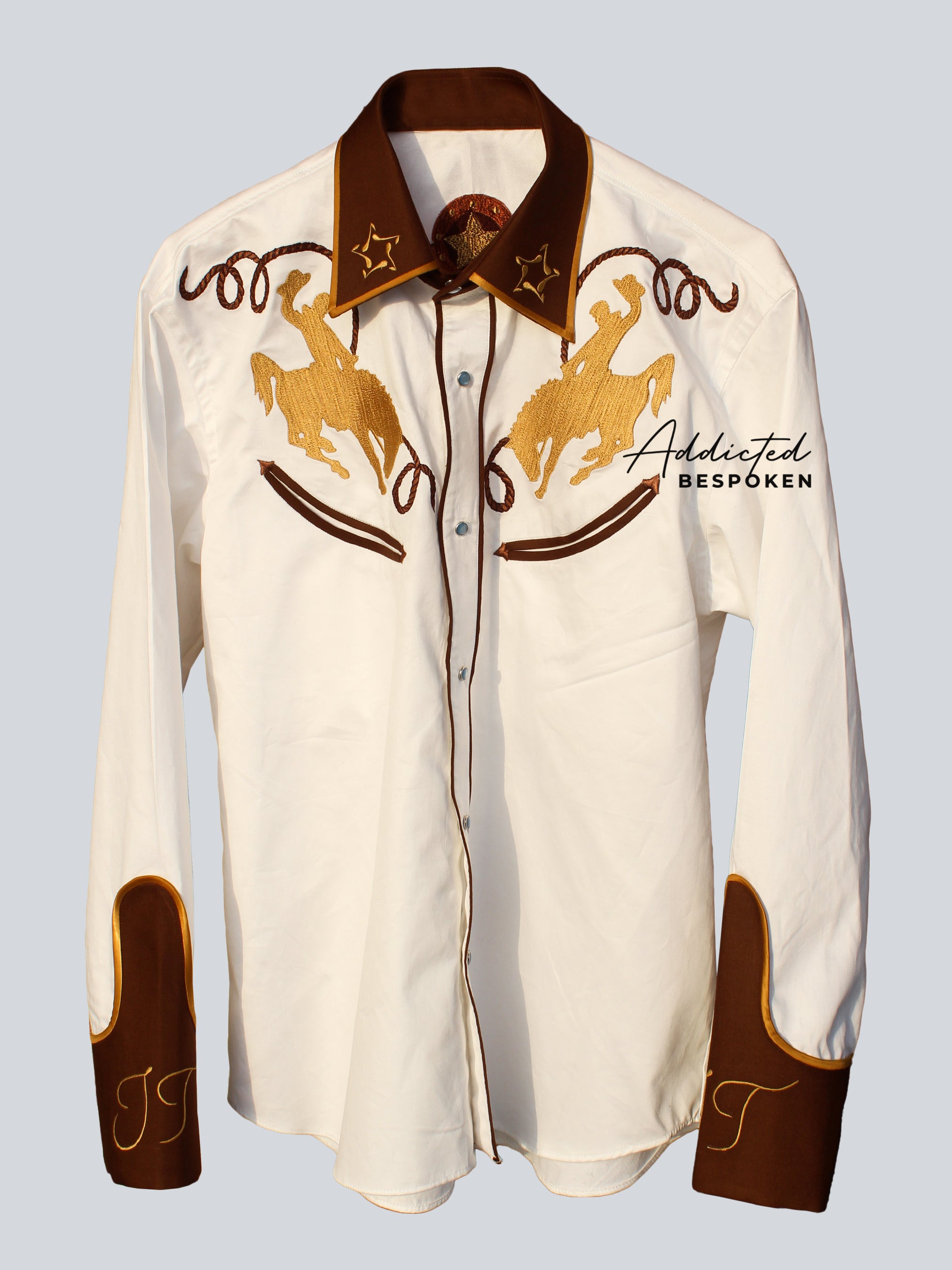 Front view of cream western shirt with brown collar, cuffs, and golden horse embroidery – Addicted Bespoken