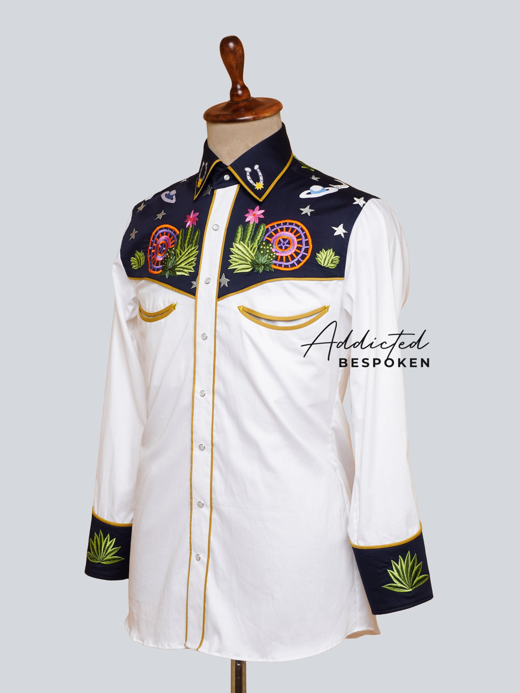 Rear angled mannequin view of white western shirt with black embroidered yoke – Addicted Bespoken