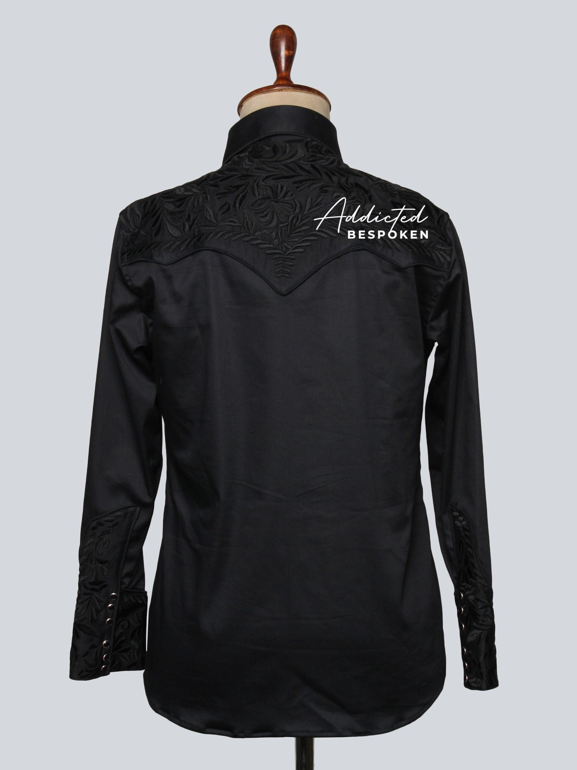 Back mannequin view of all-black embroidered western shirt β Addicted Bespoken