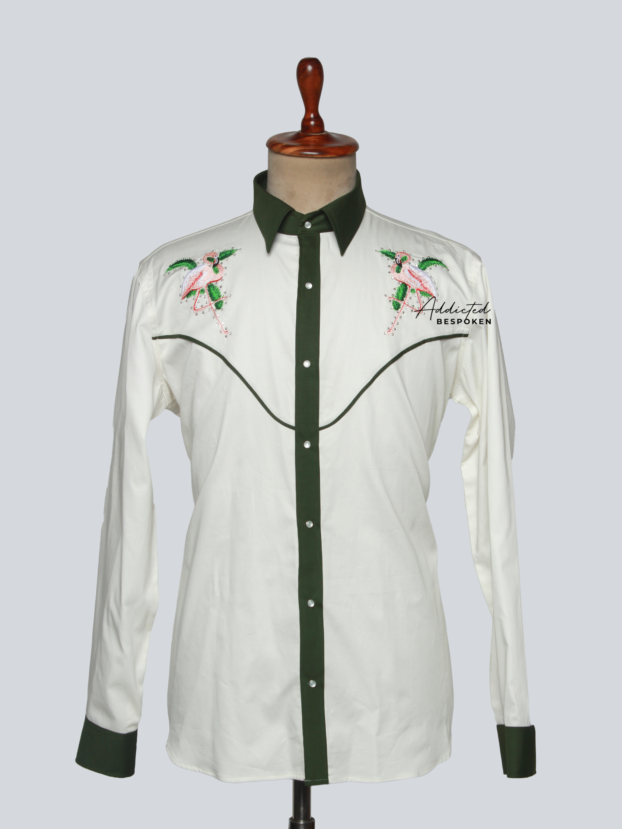 Front view of white western shirt with green piping and pink floral embroidery โ Addicted Bespoken