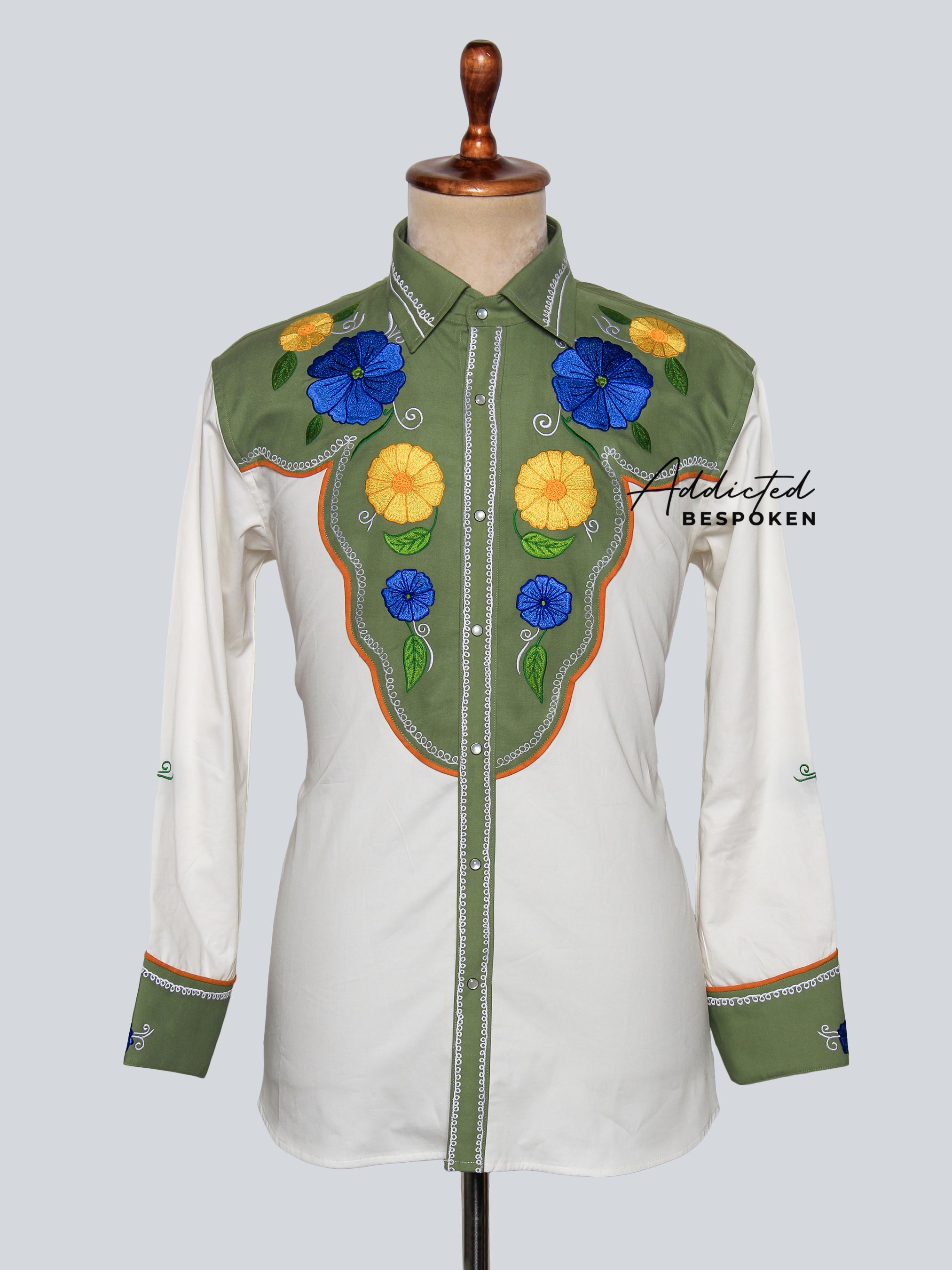 Front view of white western shirt with green yoke and large colorful floral embroidery – Addicted Bespoken