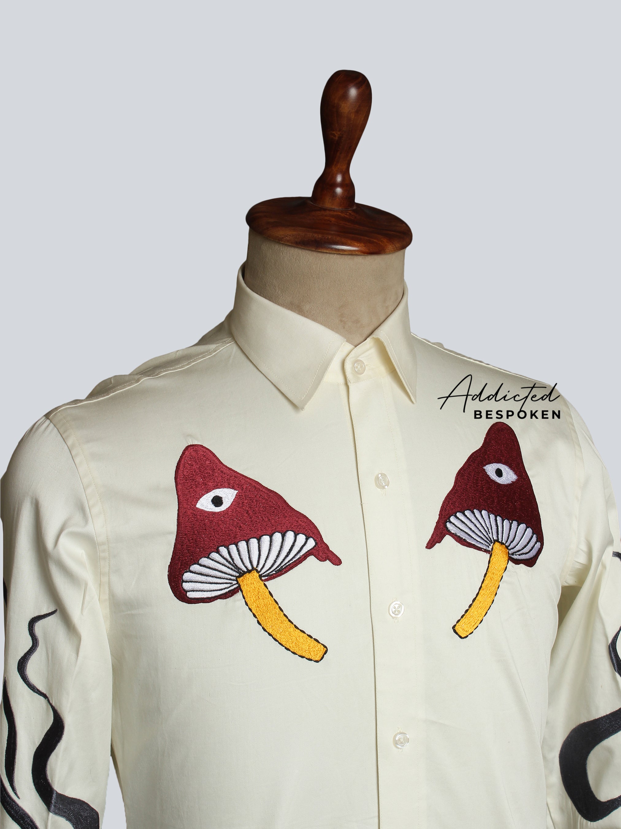 Close-up of cactus embroidery detail on cream western shirt โ Addicted Bespoken