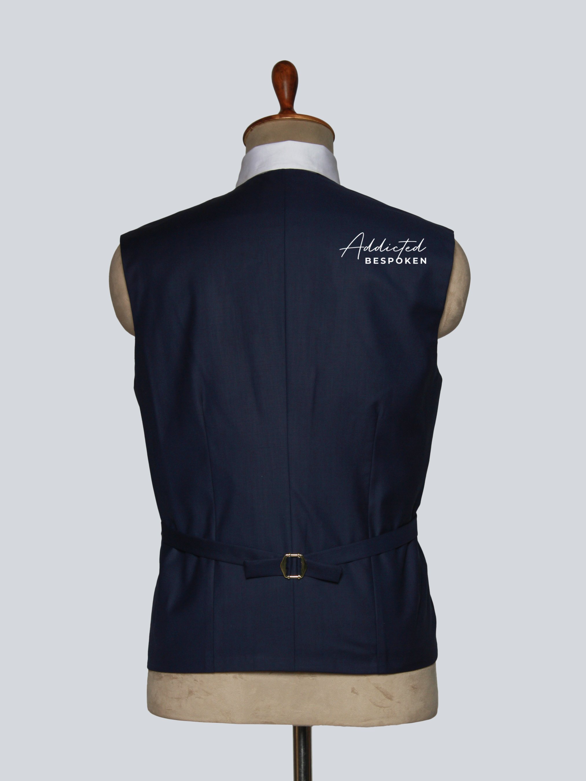 Back view of men’s formal vest suit – custom tailored jacket and trousers