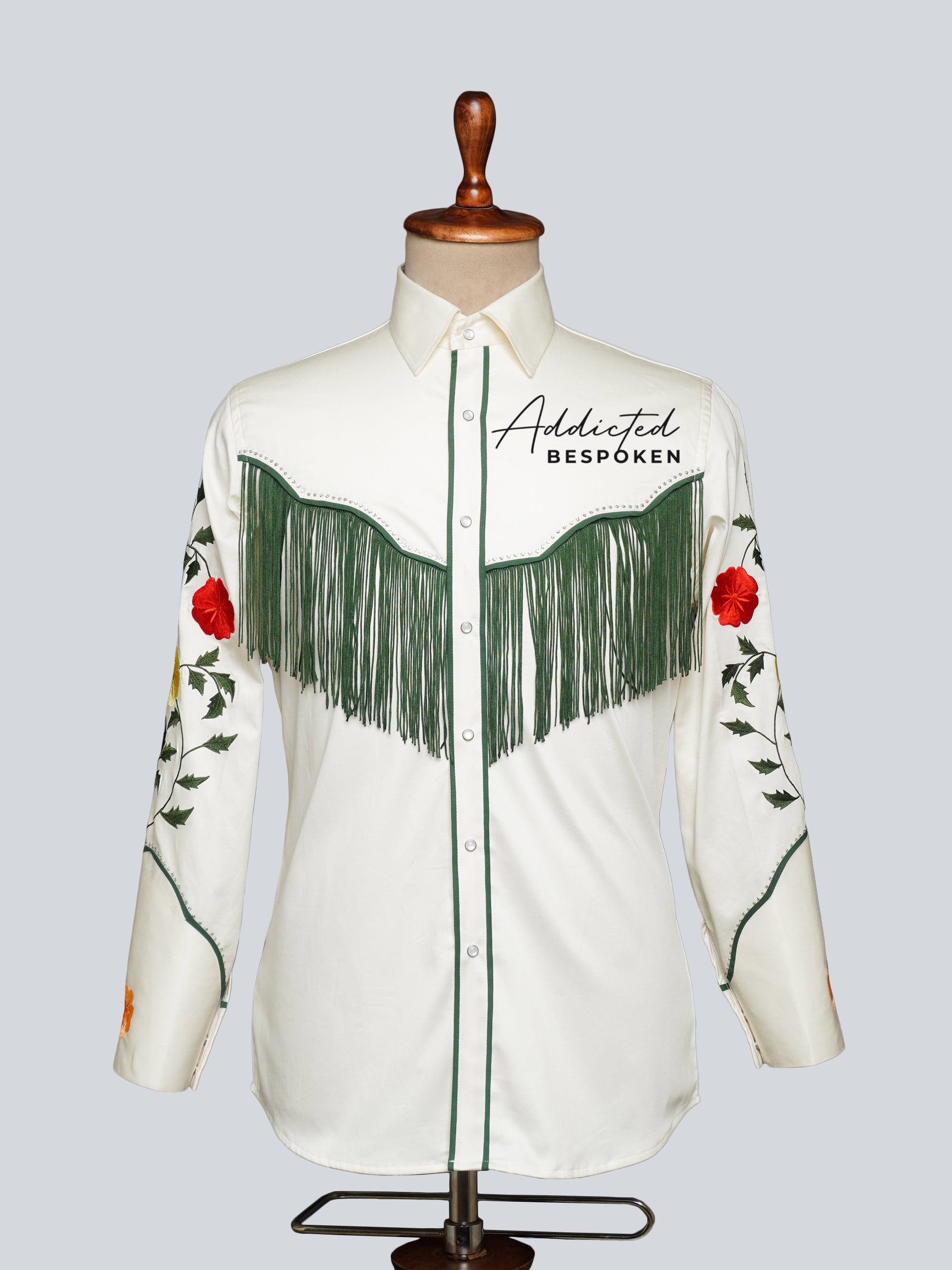 Front view of white western shirt with green fringe and floral embroidery on sleeves – Addicted Bespoken