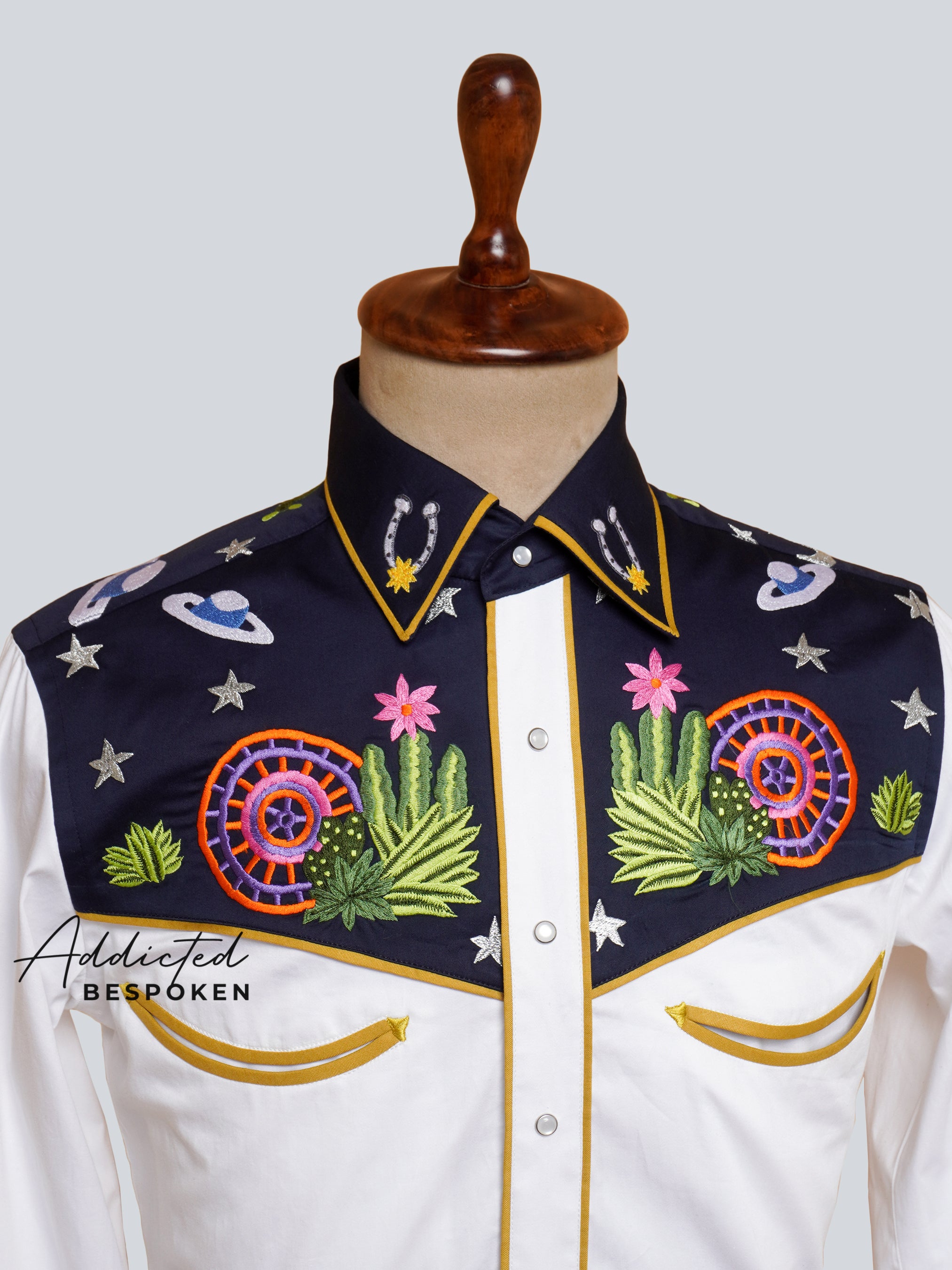 Close-up chest embroidery of colorful floral motifs on white western shirt – Addicted Bespoken