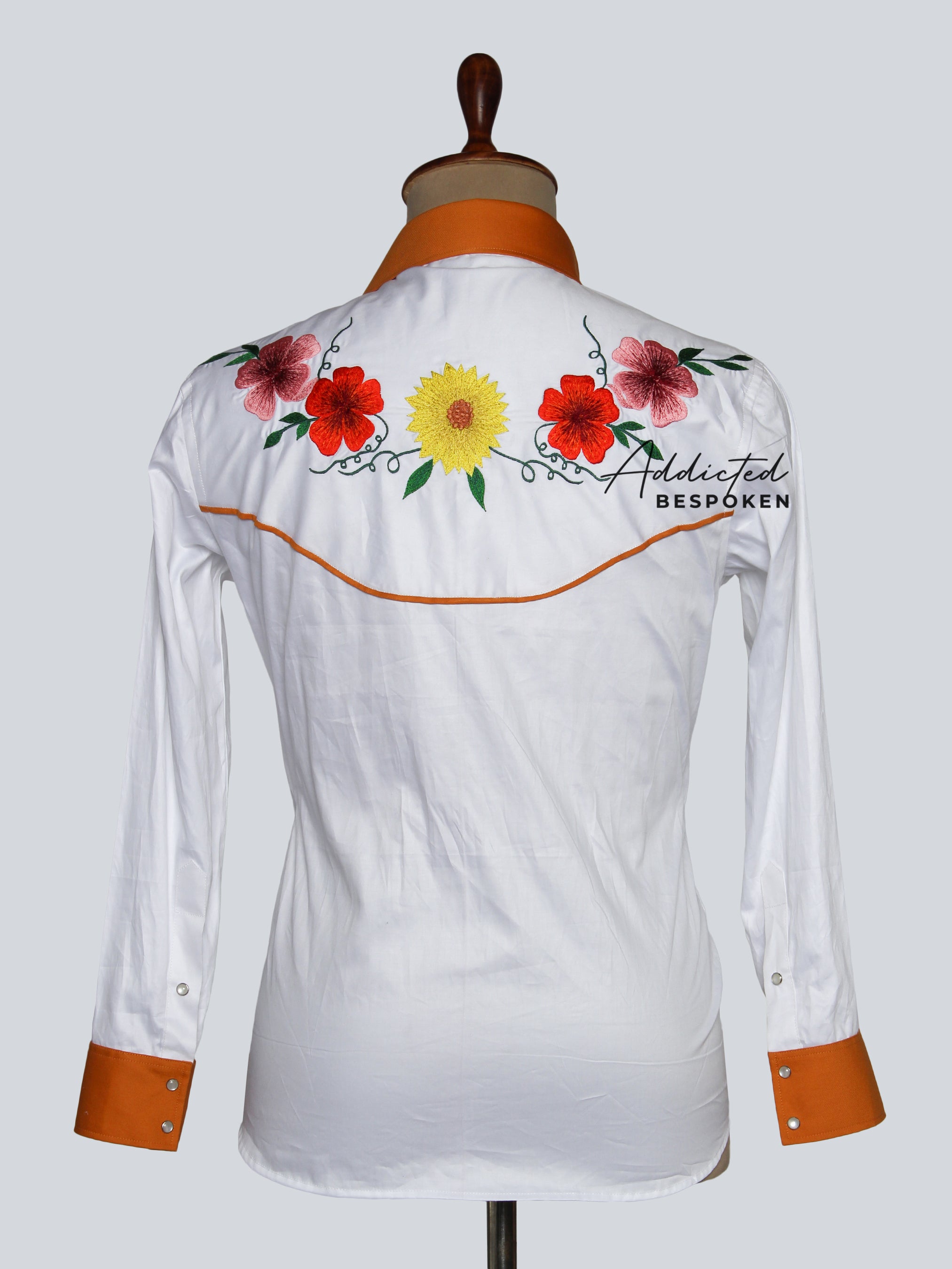 Back view of white shirt with embroidered floral motif across shoulders – Addicted Bespoken