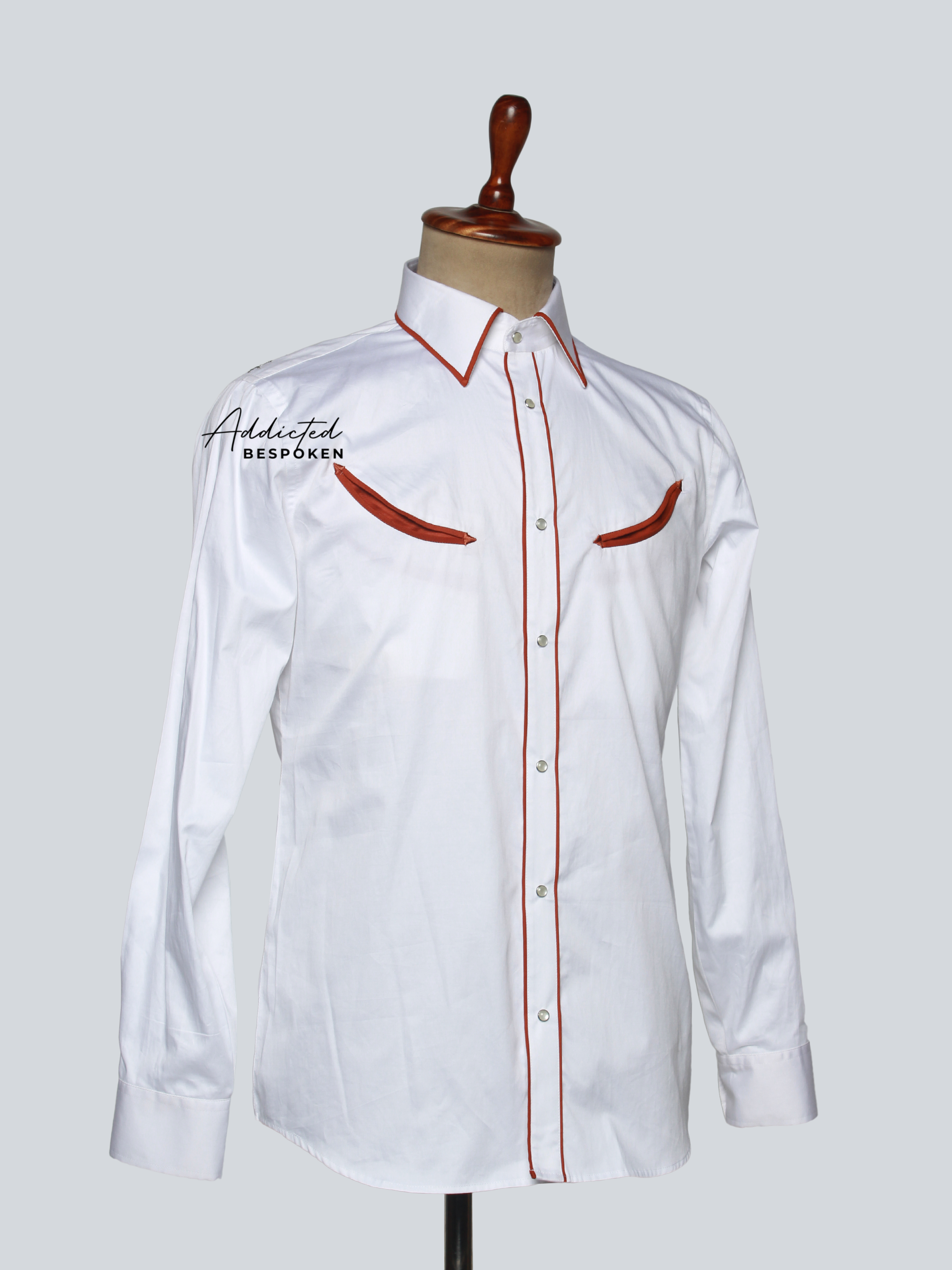 Side angled view of white embroidered western shirt with red piping – Addicted Bespoken