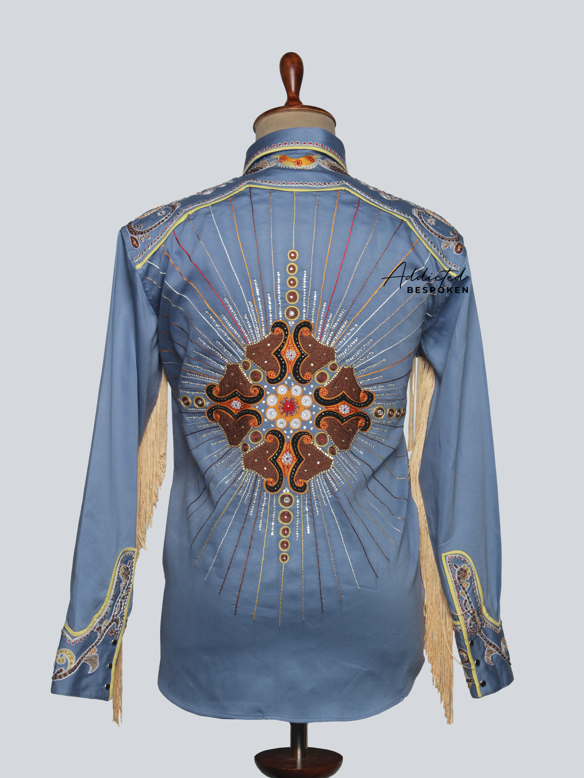 Back view of light blue embroidered western shirt with large decorative motif – Addicted Bespoken