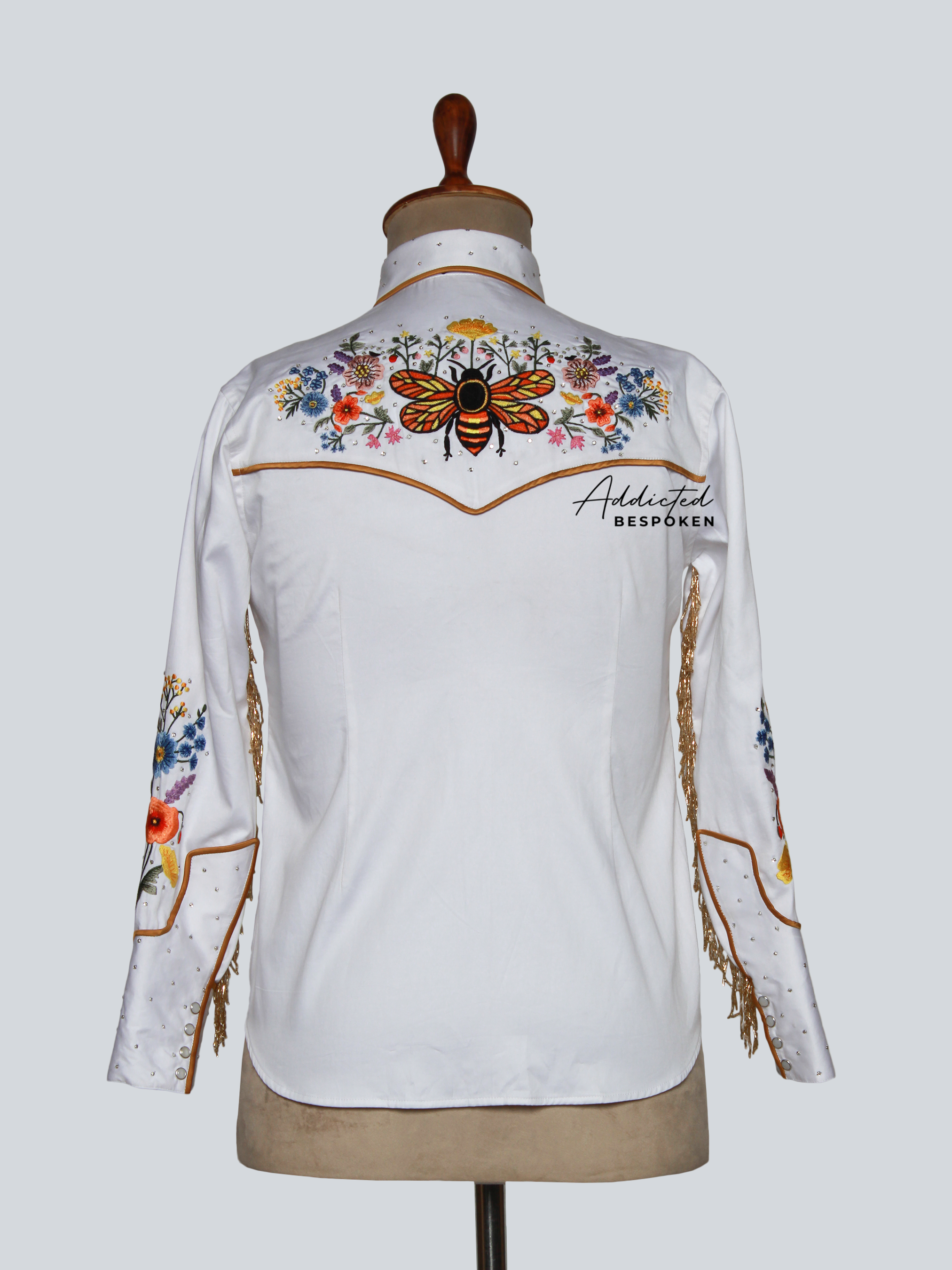 Back view of white western shirt with multicolor floral embroidery across shoulders – Addicted Bespoken