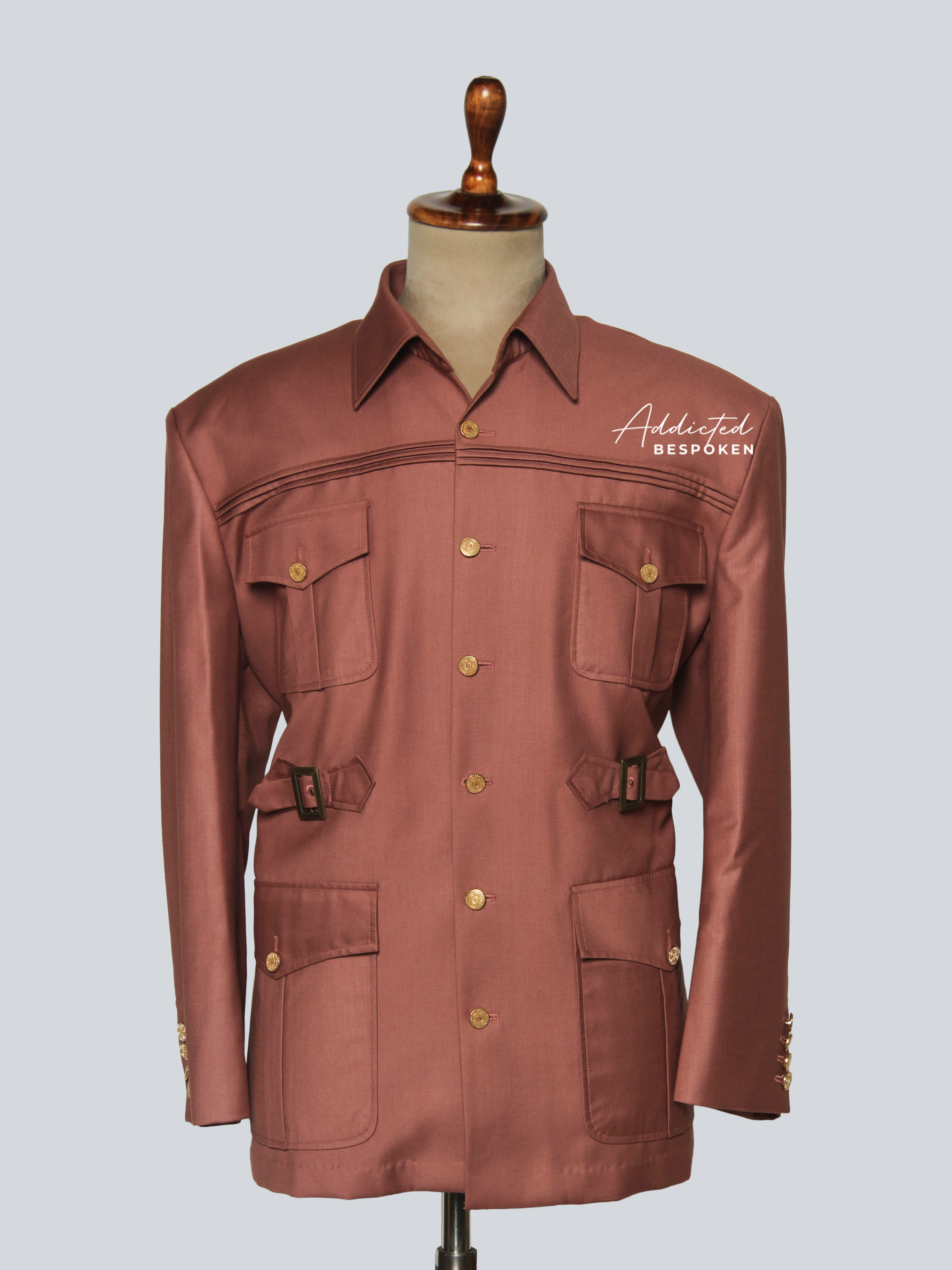 Iconic safari suit front view – men’s brown bespoke safari jacket with gold buttons and matching trousers