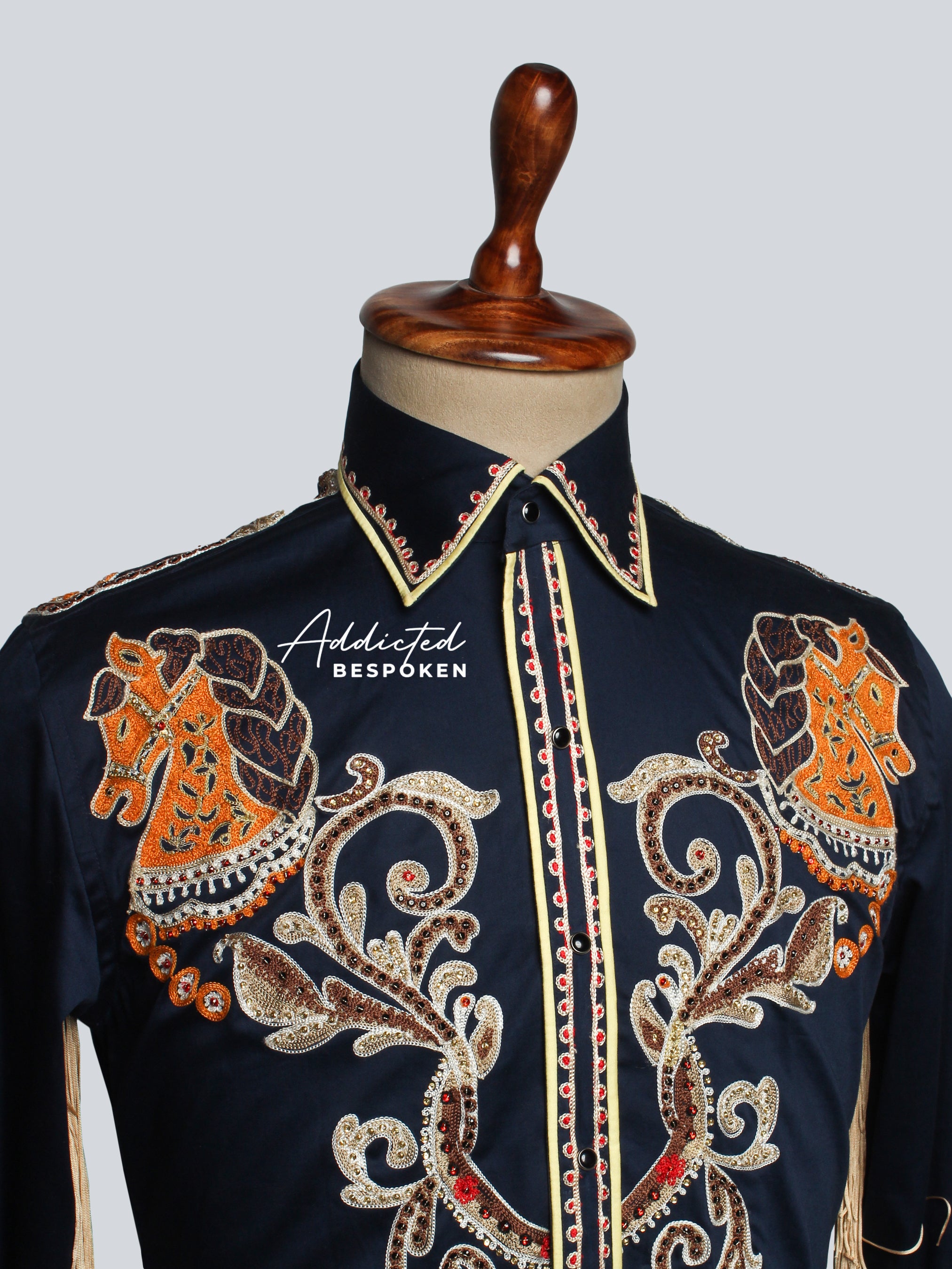 Collar close-up of navy blue embroidered western shirt with golden motifs β Addicted Bespoken