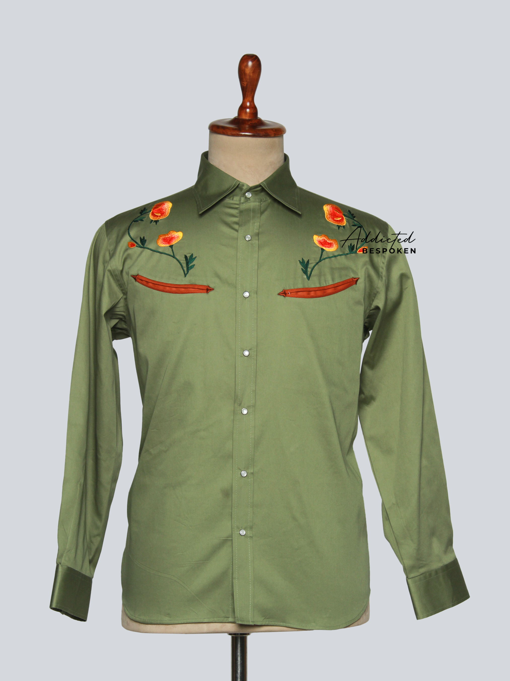 Front view of olive green western shirt with orange floral embroidery on chest and shoulders – Addicted Bespoken
