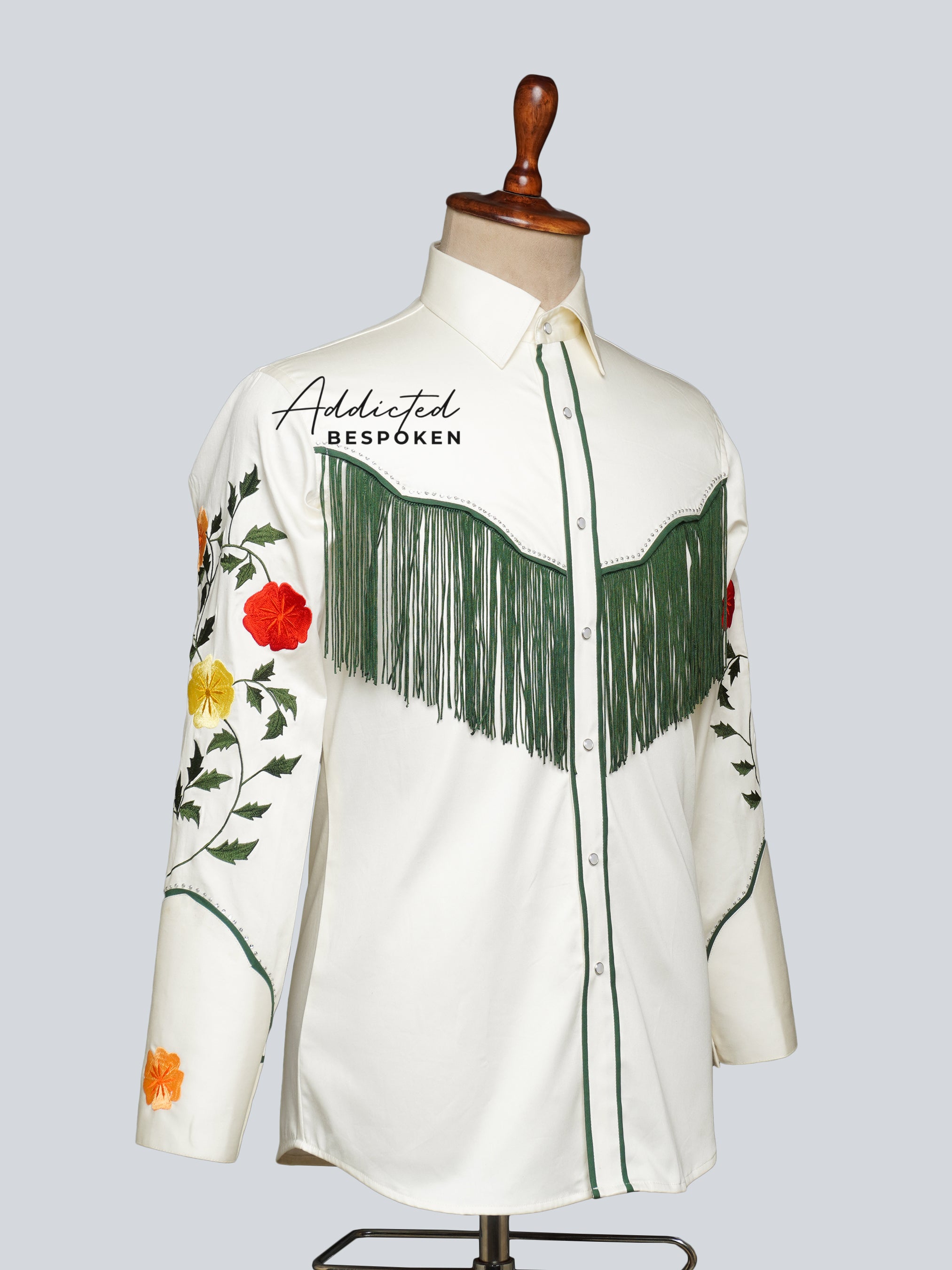 Side angled view of white western shirt with floral embroidery and fringe โ Addicted Bespoken