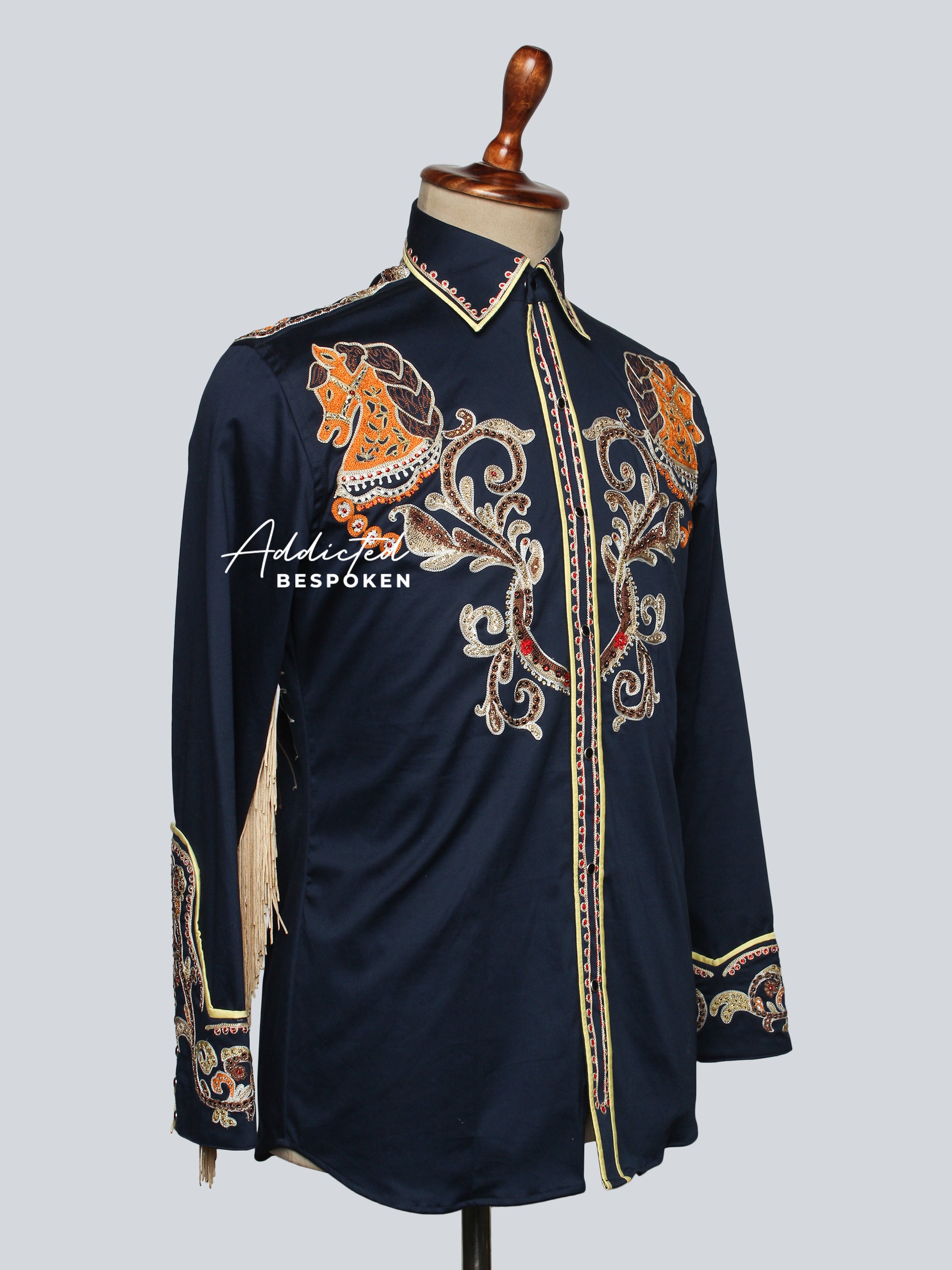 Angled mannequin view of navy embroidered western shirt with golden embroidery β Addicted Bespoken
