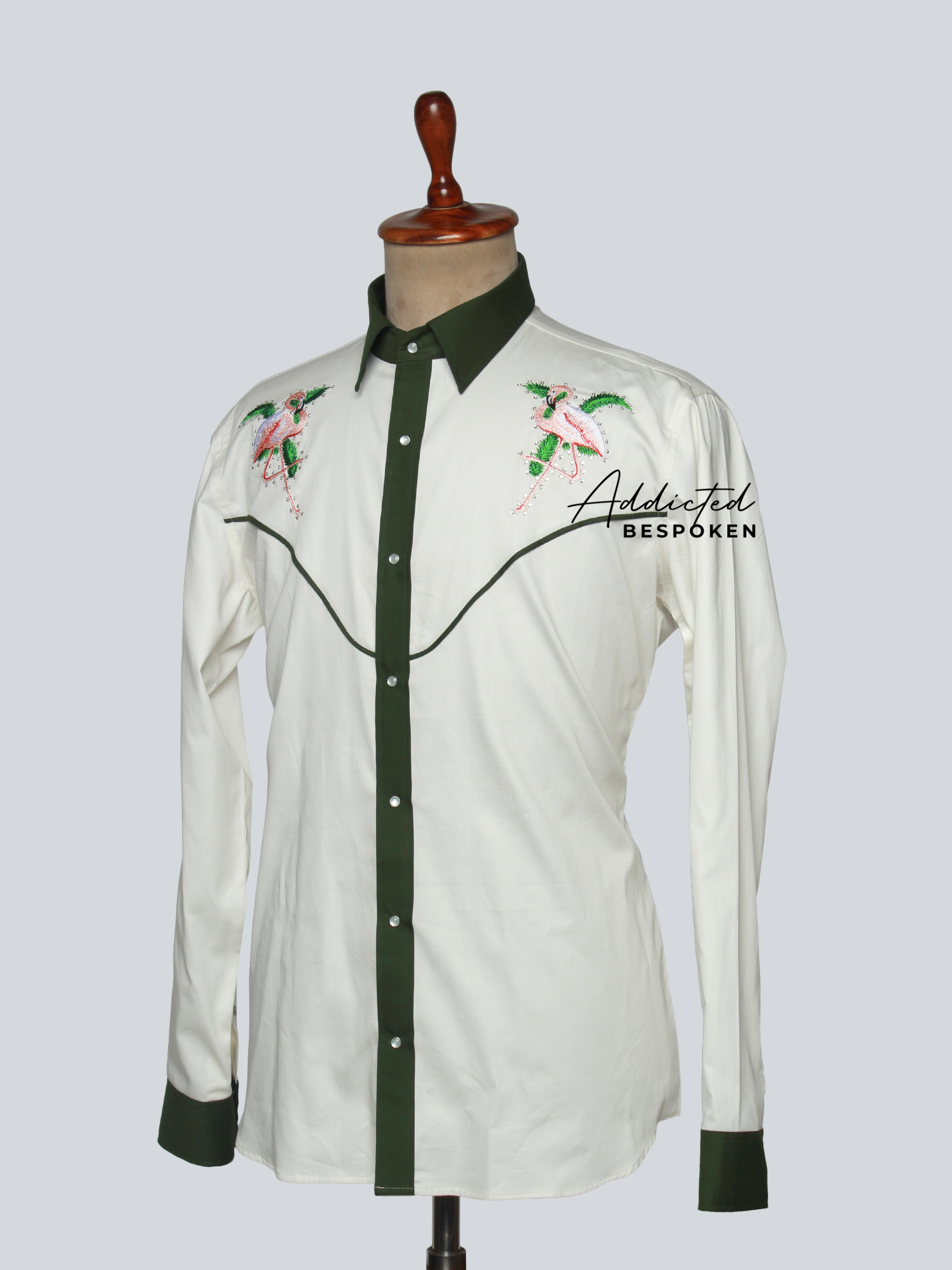 Side angled view of white embroidered western shirt with green accents โ Addicted Bespoken