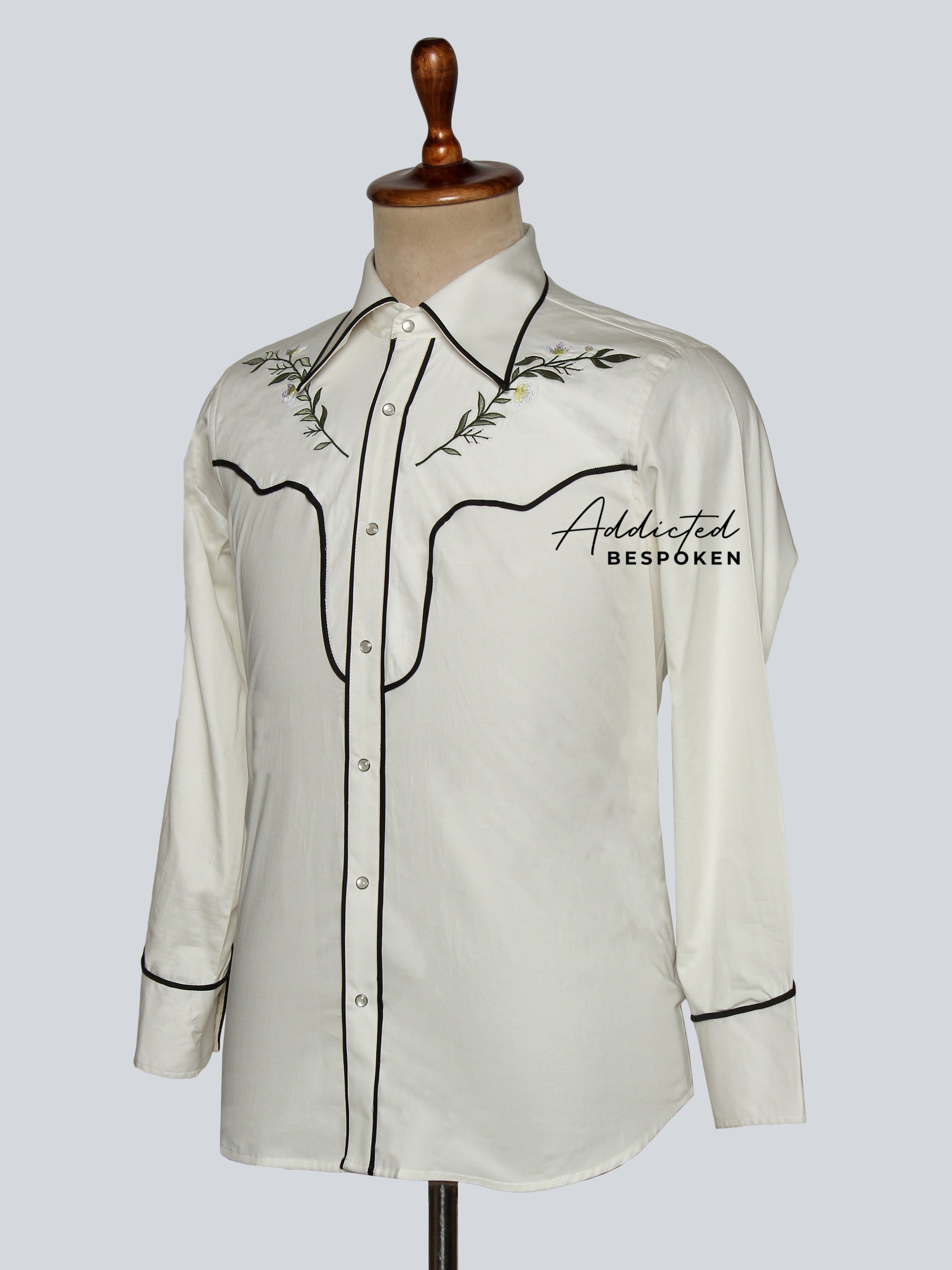 Side angled view of white embroidered western shirt with black piping – Addicted Bespoken