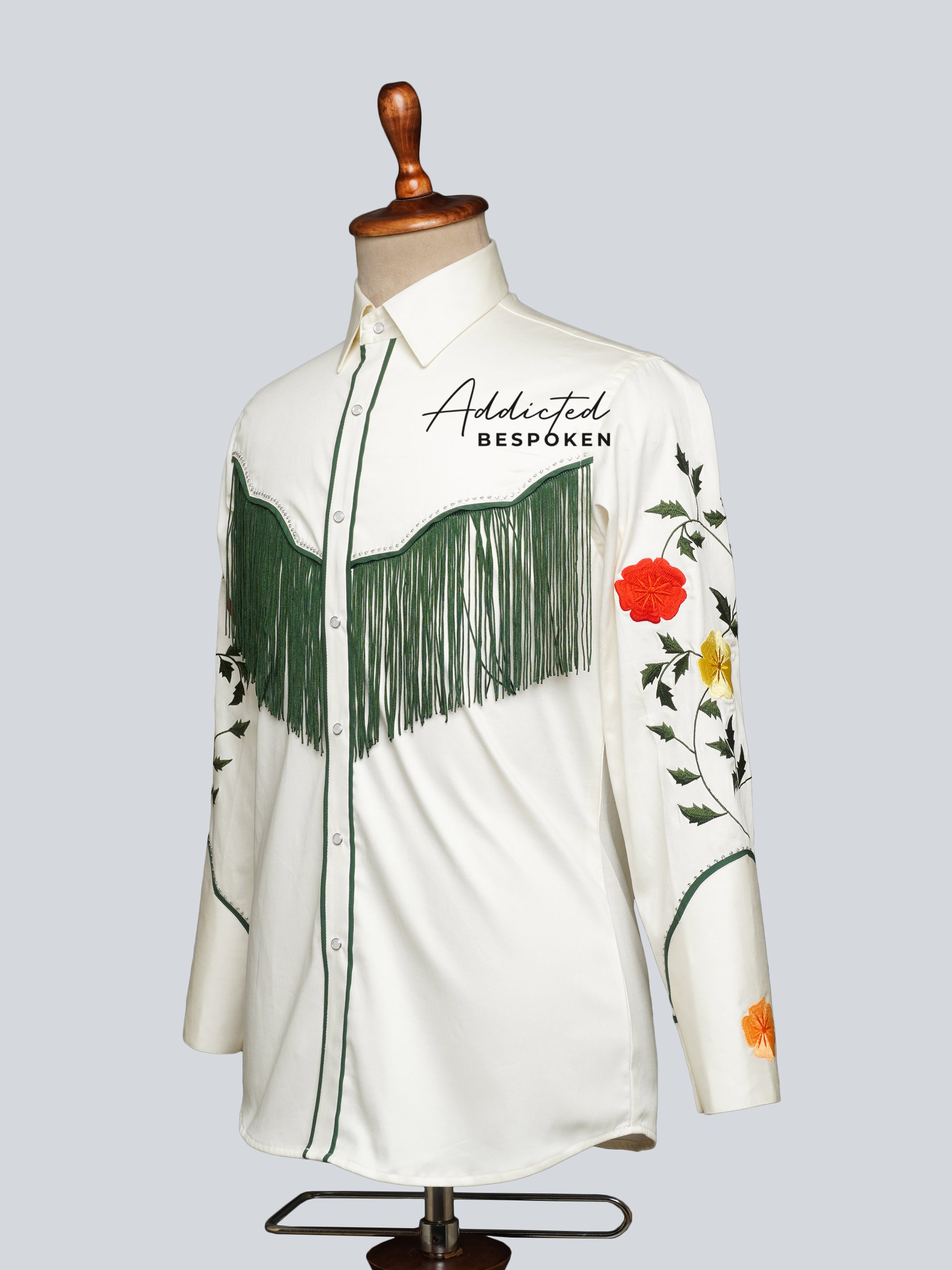 Rear angled view of white western shirt with embroidered sleeves and fringe โ Addicted Bespoken