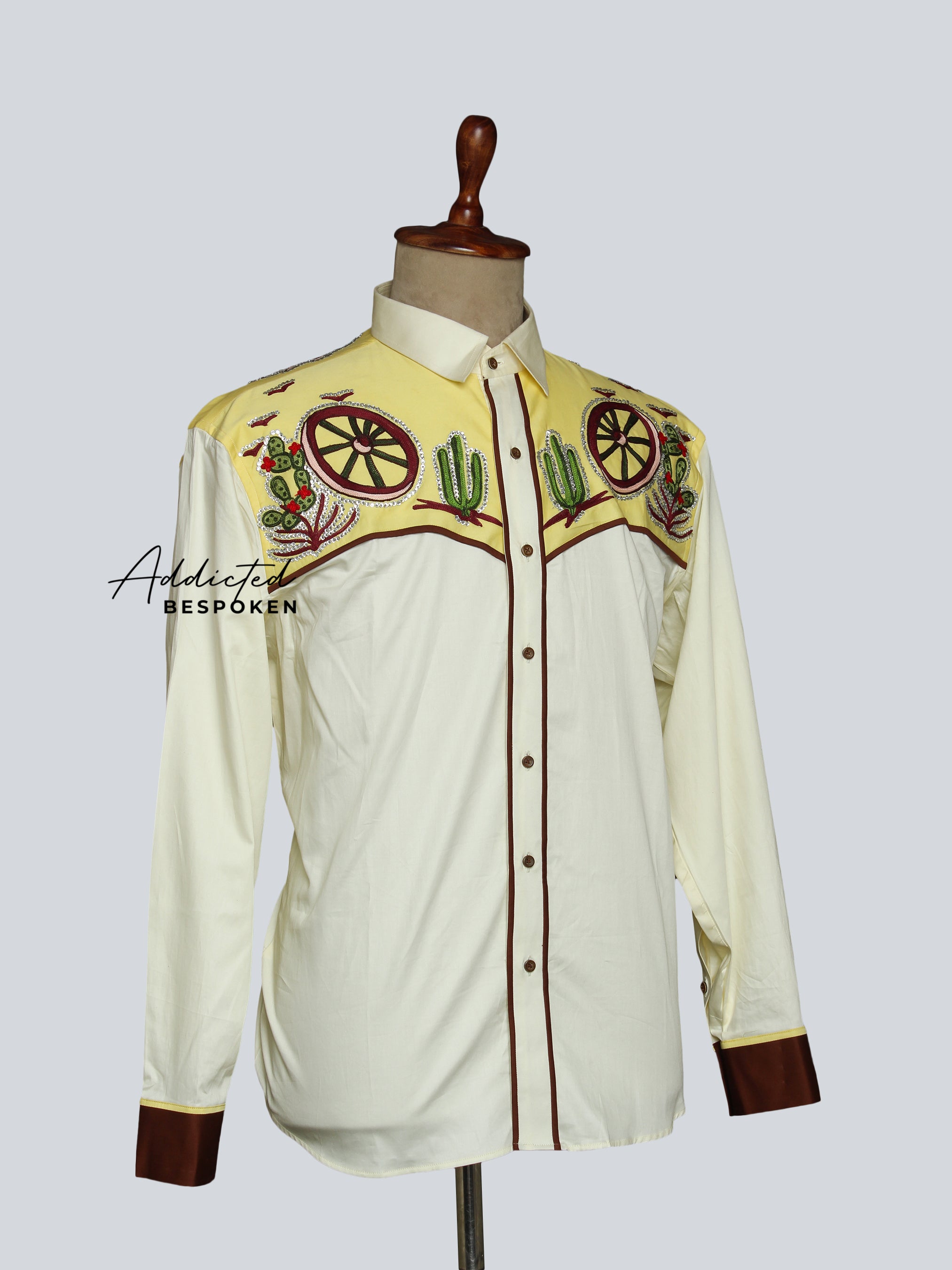 Angled side view of cream western shirt with embroidery on chest and shoulders – Addicted Bespoken