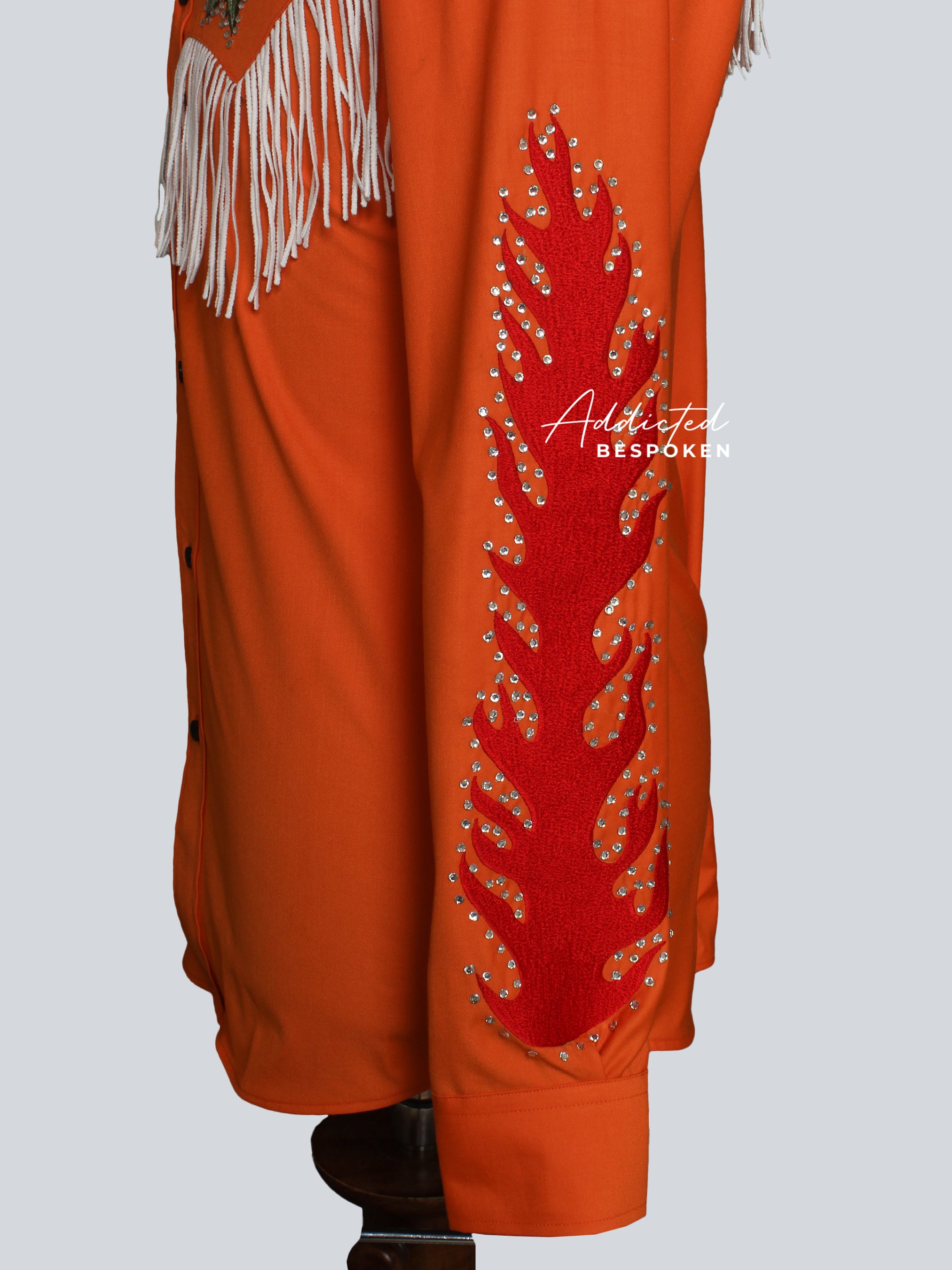 Side view of orange western shirt showing embroidered sleeve motif โ Addicted Bespoken