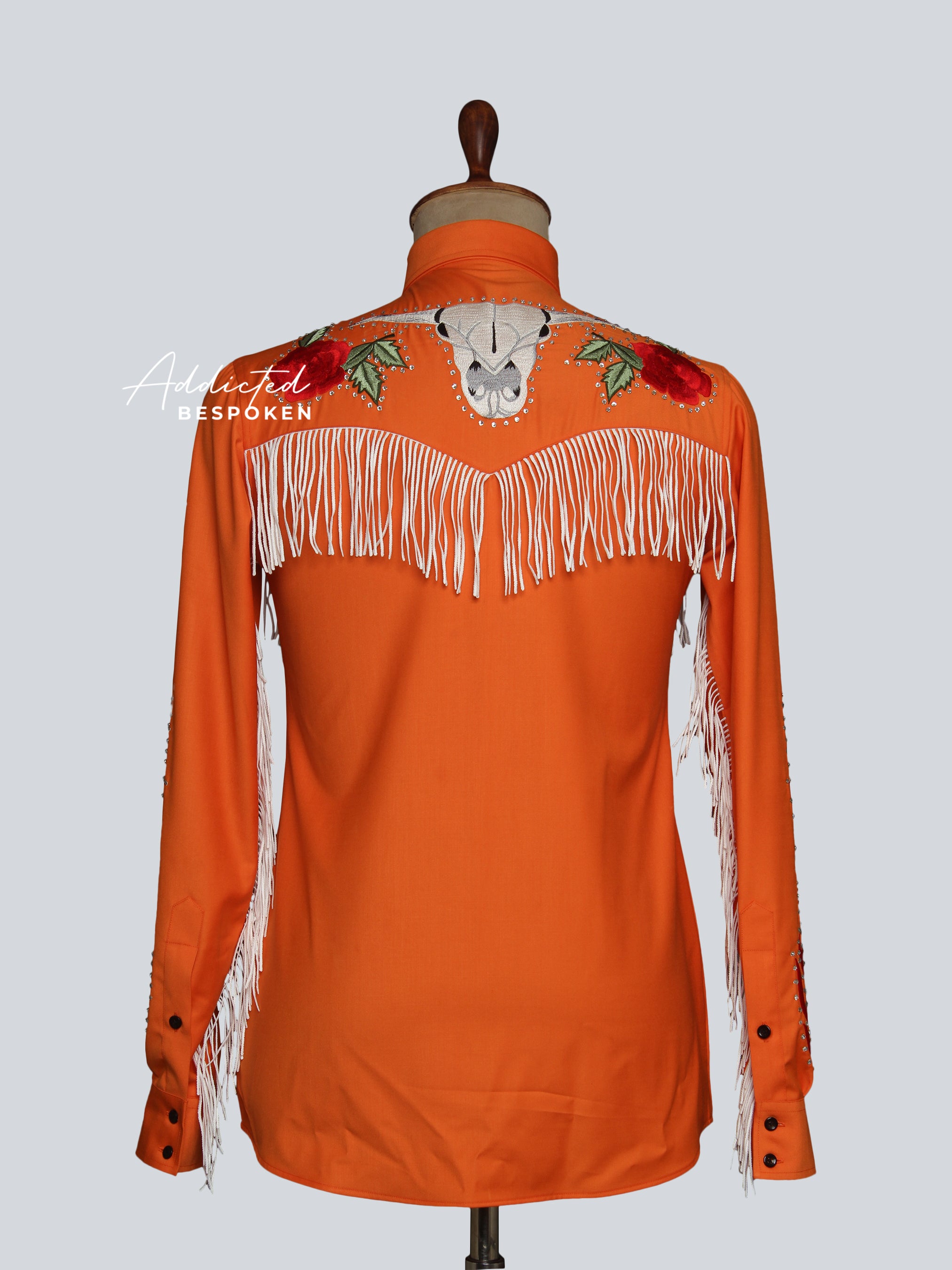 Front view of orange western shirt with white fringe and floral embroidery – Addicted Bespoken