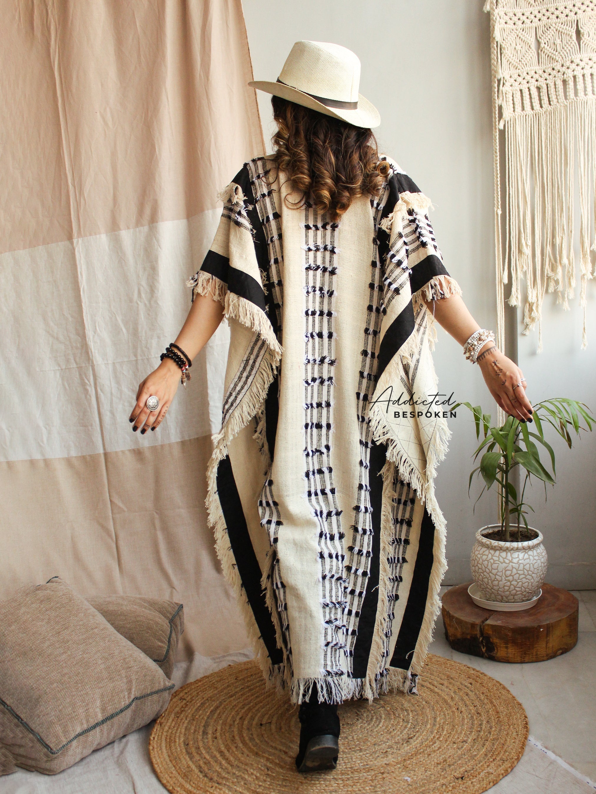 Back view of Nomadic Boho Cardigan Coat – layered boho chic outerwear with fringe