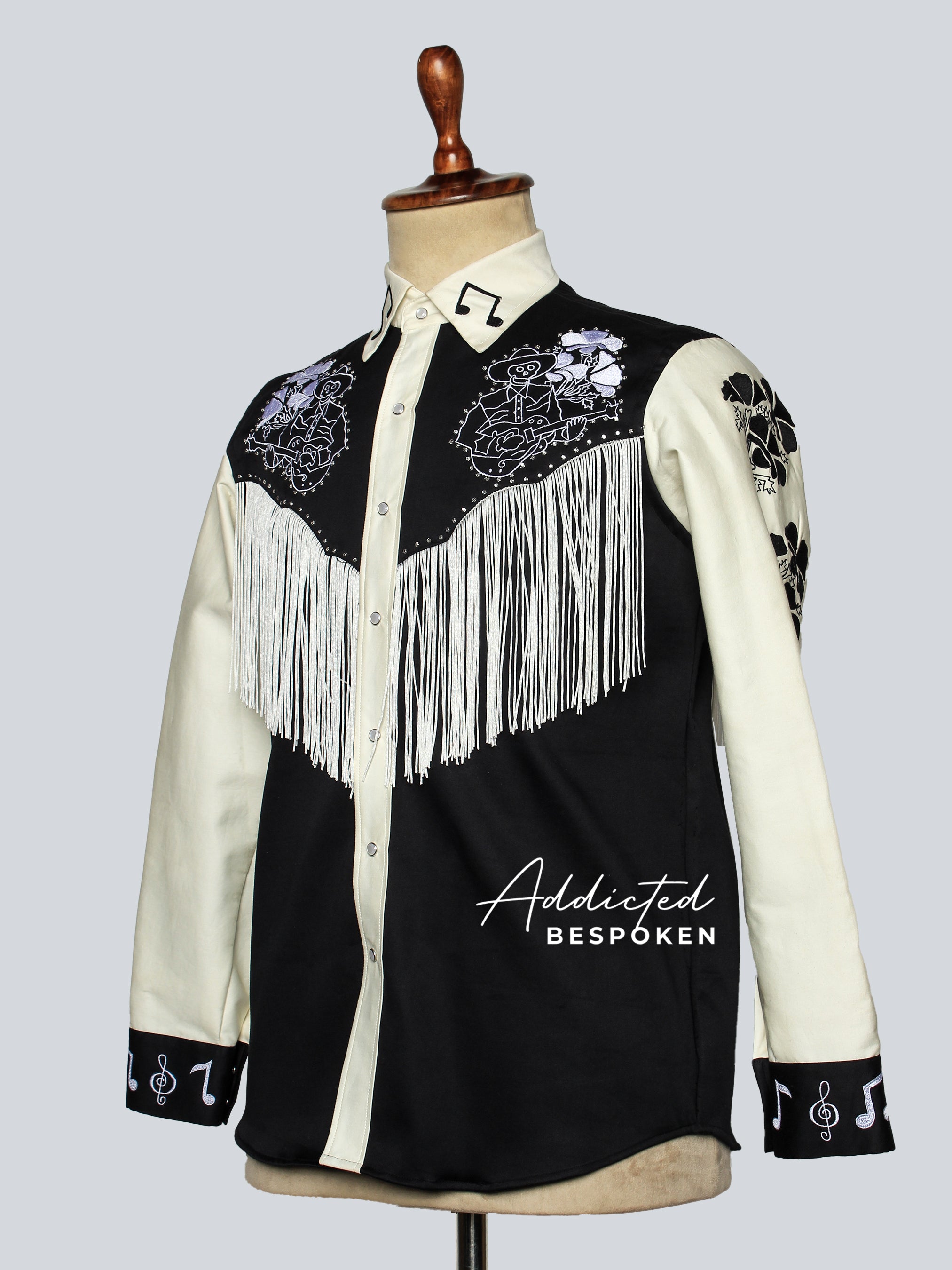 Angled side view of black and white embroidered western shirt with fringe – Addicted Bespoken