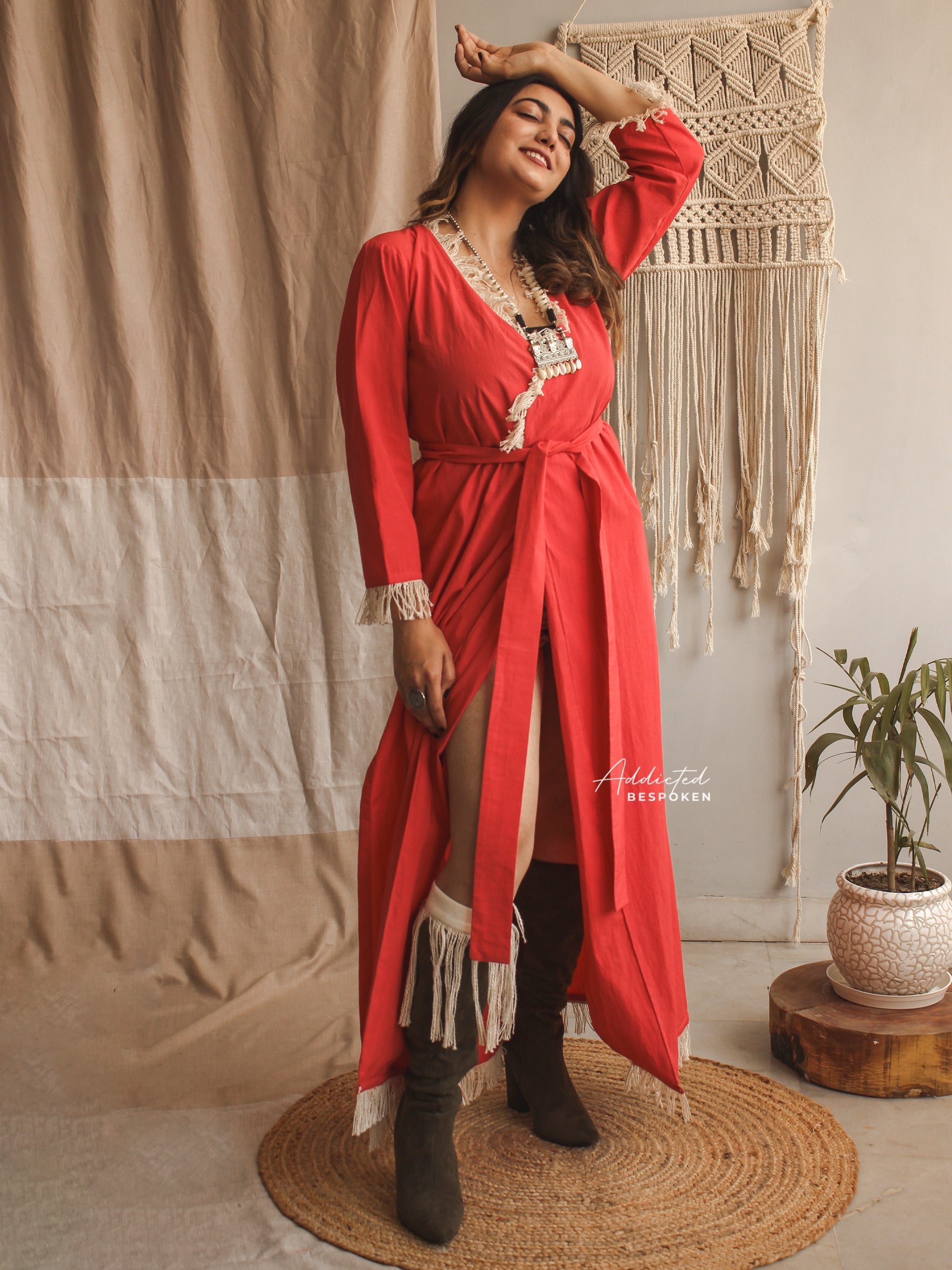 Fringe detailing on neckline and cuffs of Boho Wrap Dress