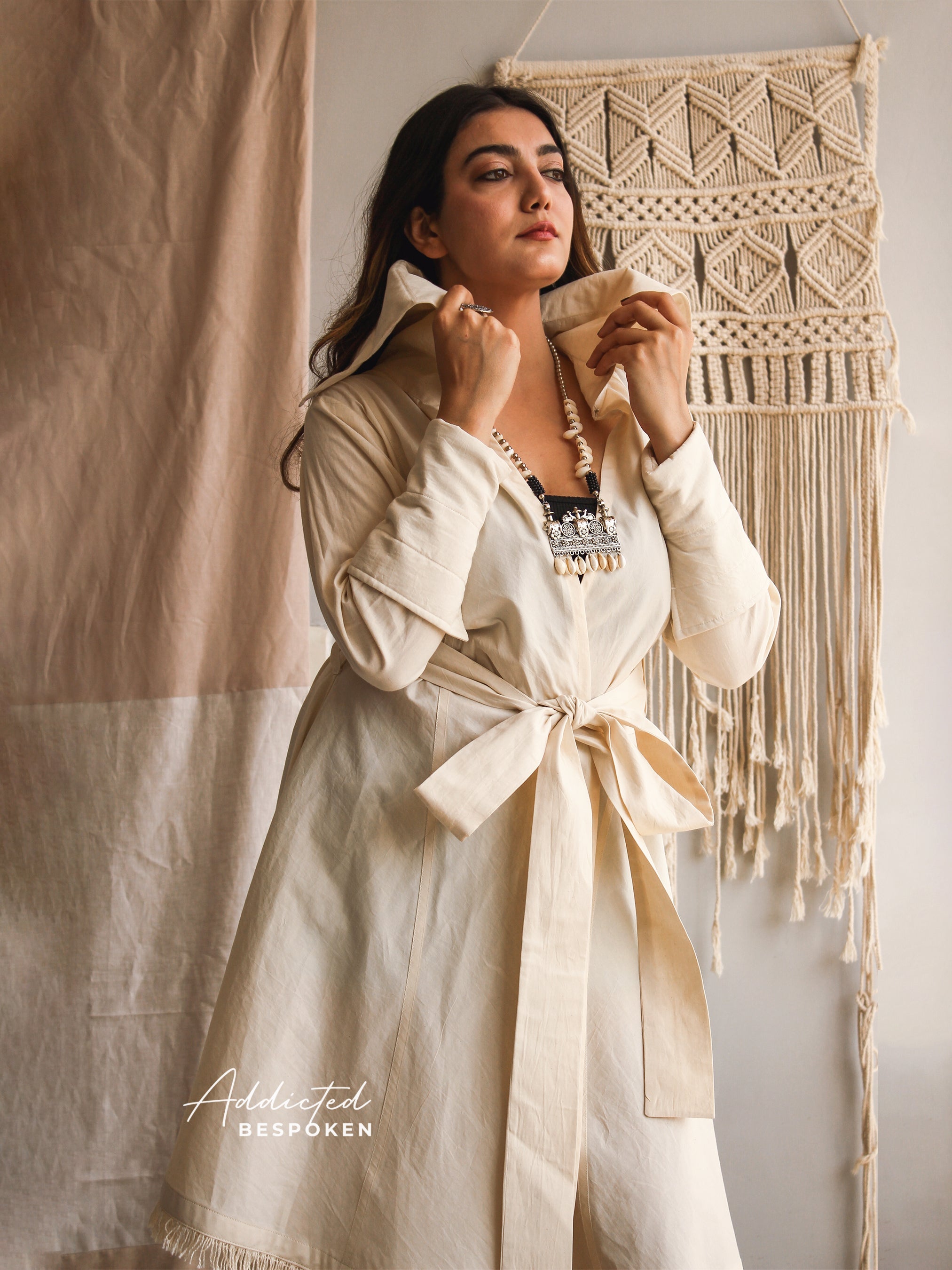 Woman wearing Free Spirit Maxi Dress with belted waist and raised collar detail β bohemian style clothing