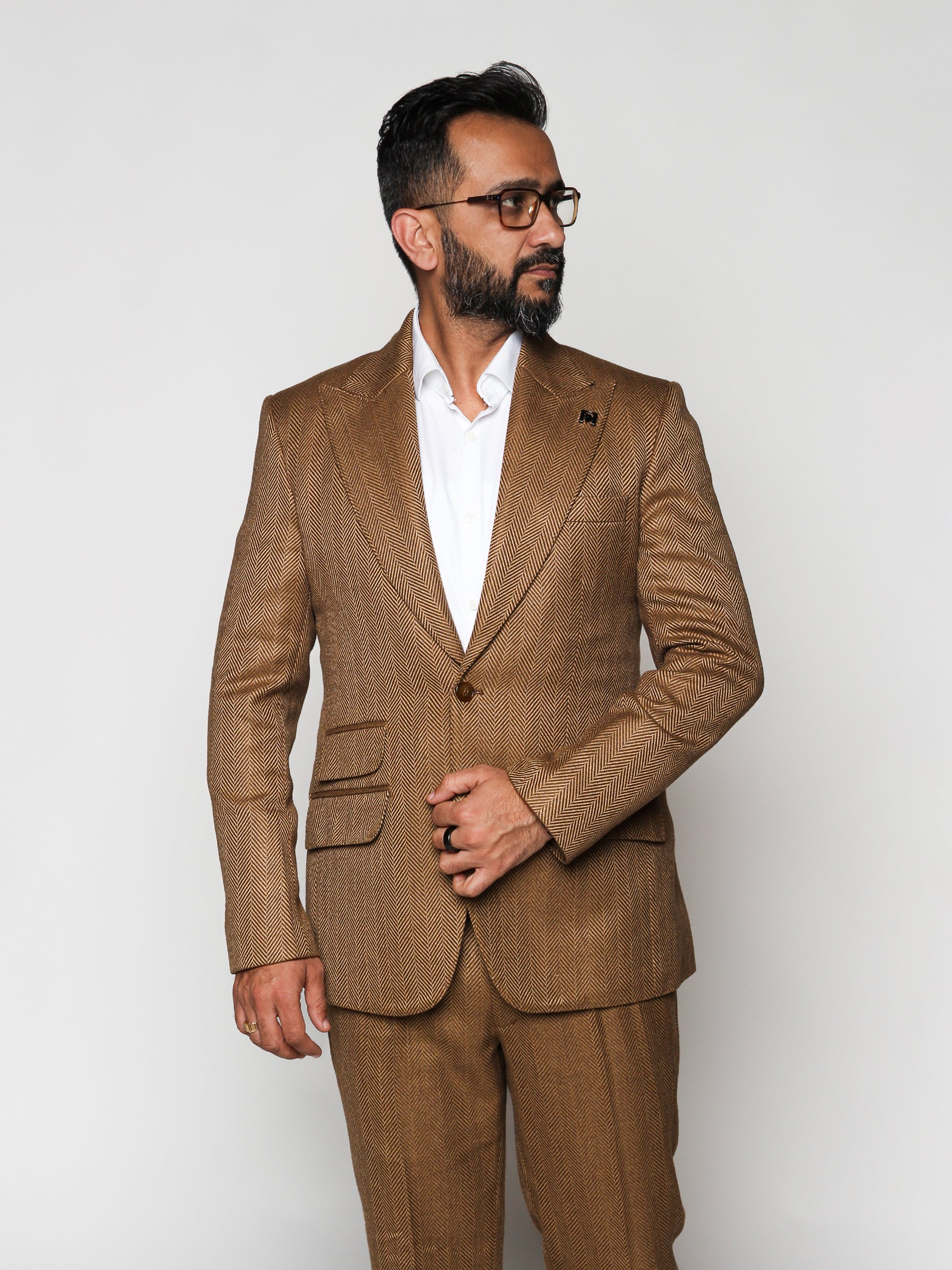 Custom suits, Bespoke Suits, Tailored clothing, Men's custom suits, Tailorman suits.