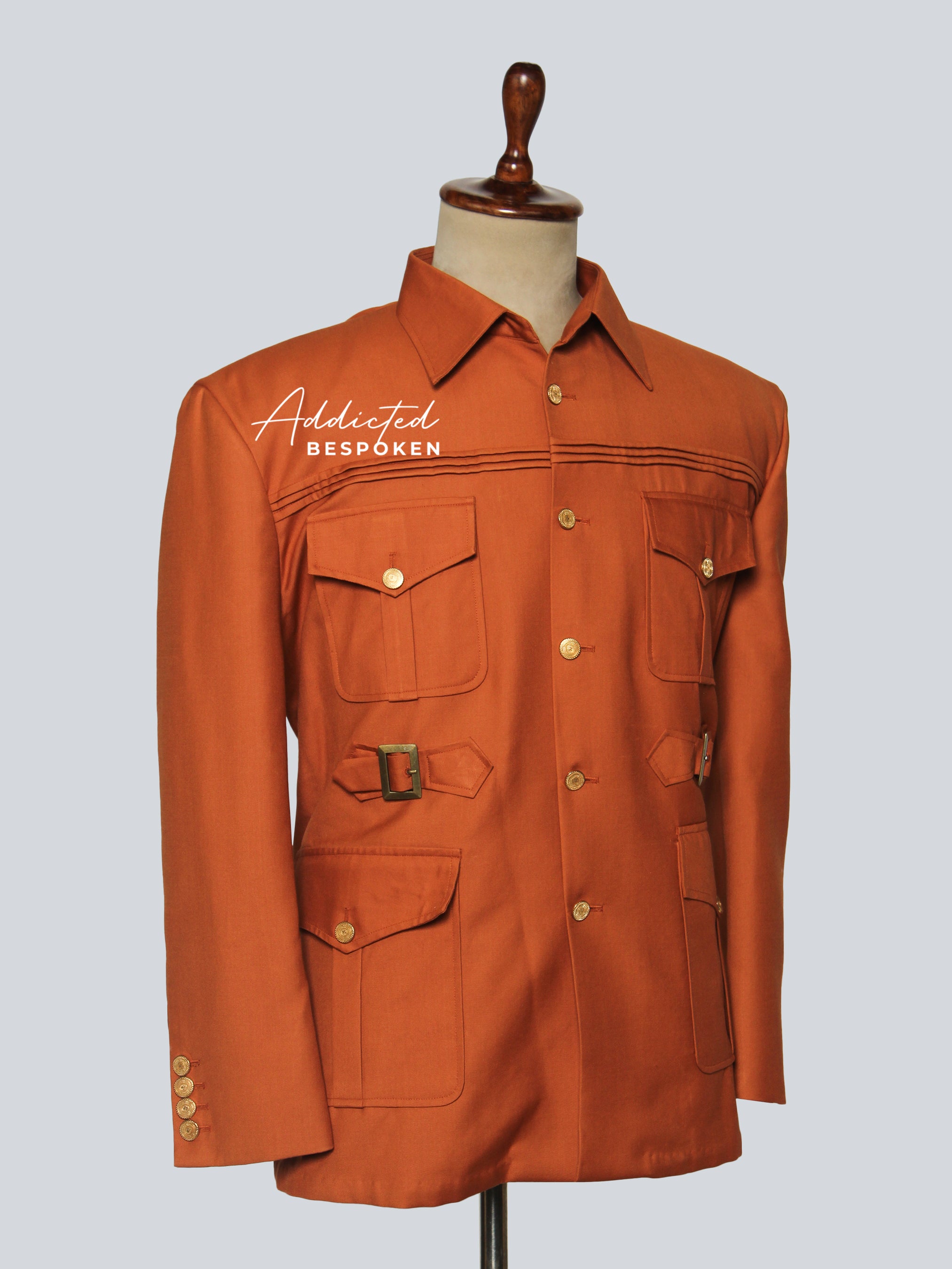 Two-piece safari suit for men – tailored jacket and trousers set in rust brown