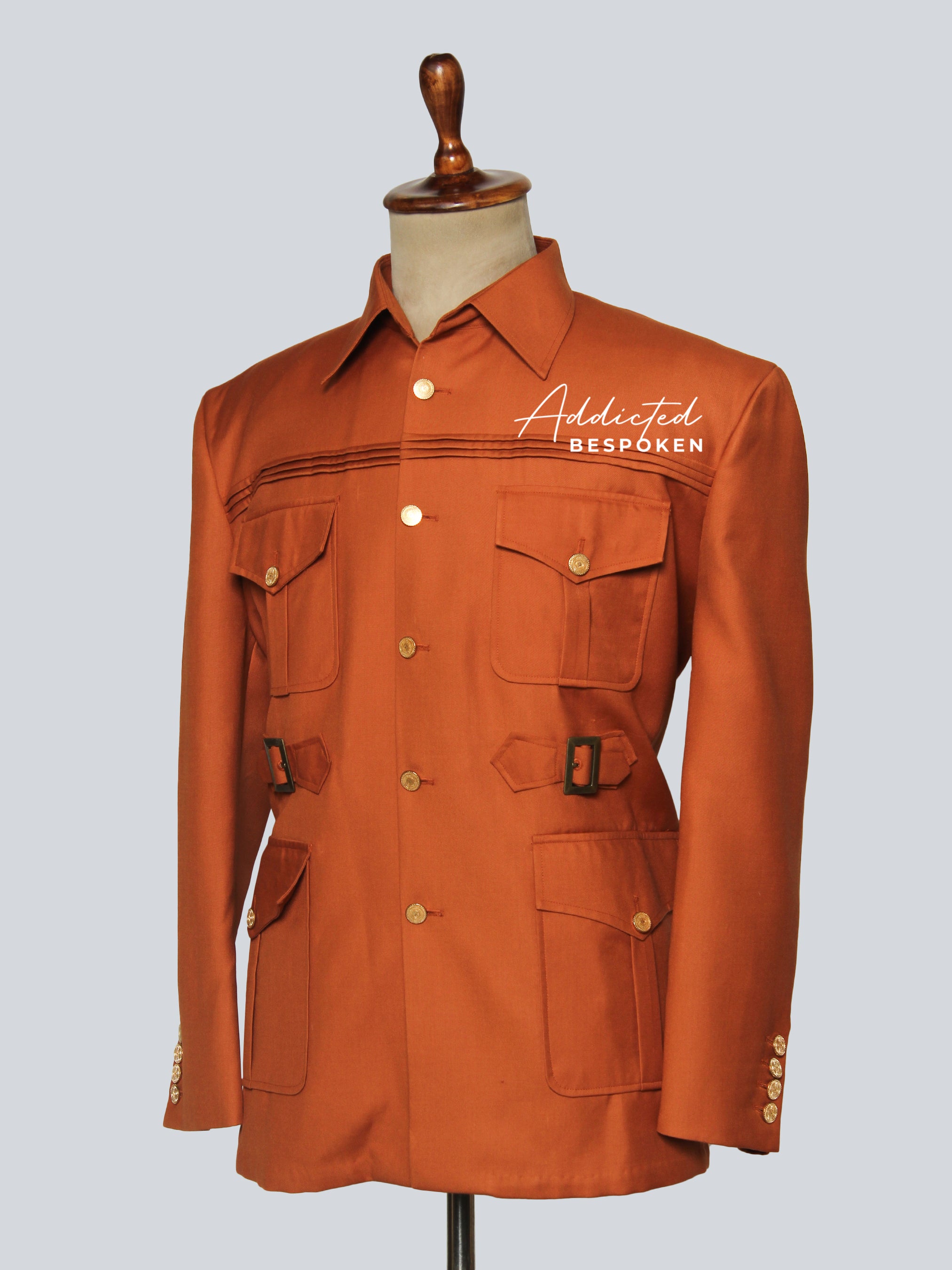 Bespoke safari suit outfit – rust brown jacket and trousers side angle