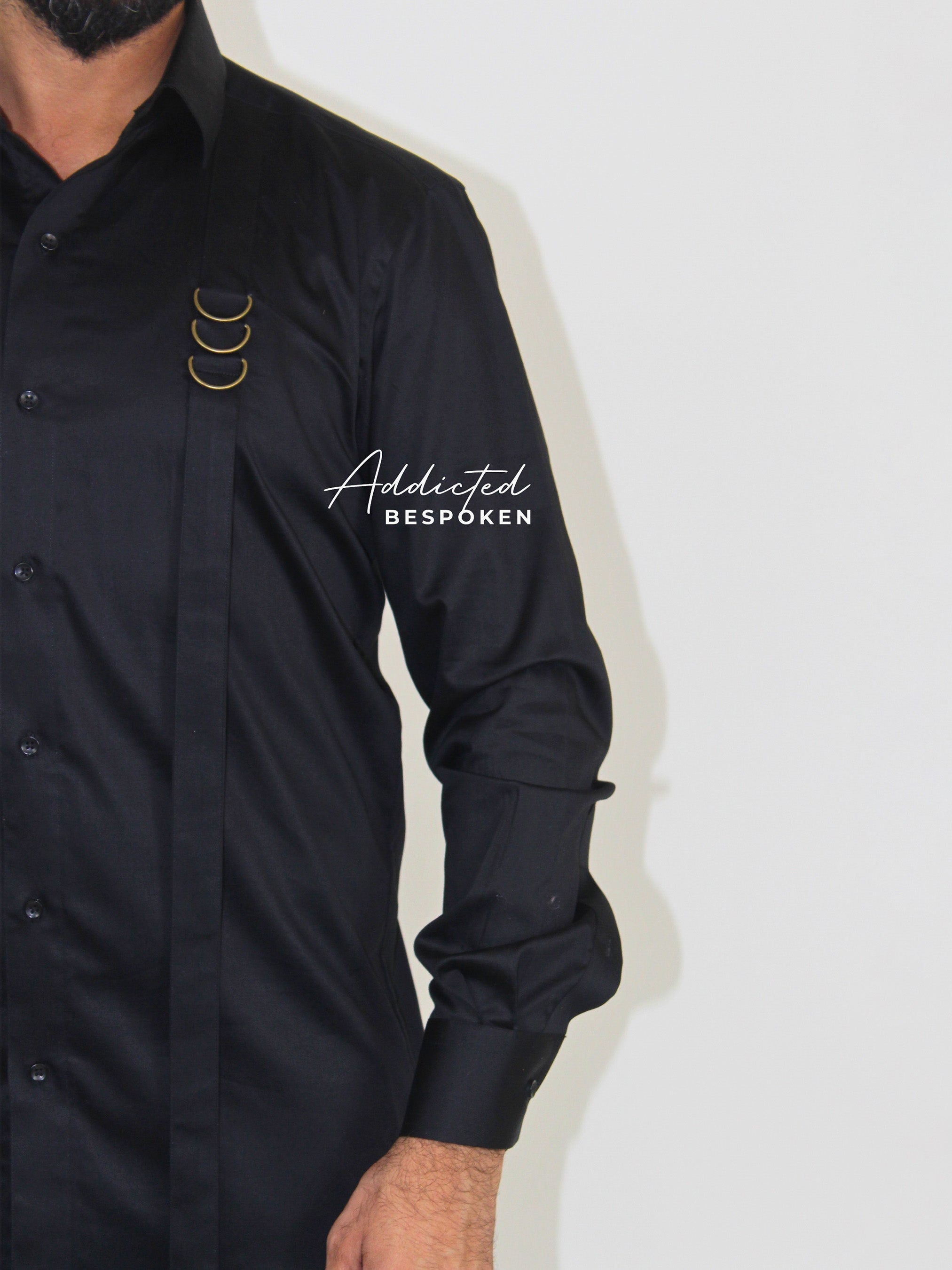 Close-up chest view of black embroidered shirt with logo – Addicted Bespoken
