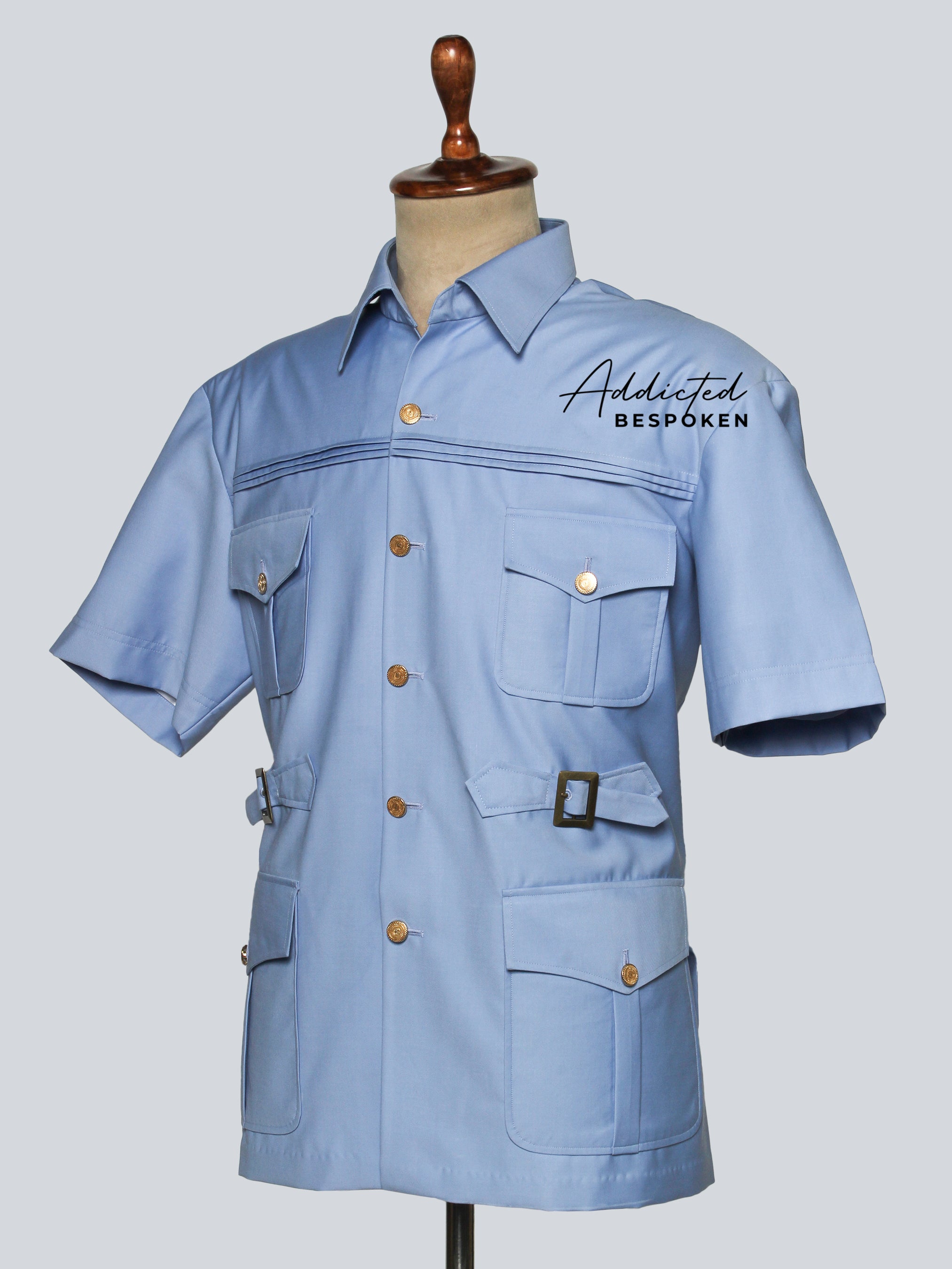 Detailed button and stitching of men’s classic safari shirt – Addicted Bespoken tailoring