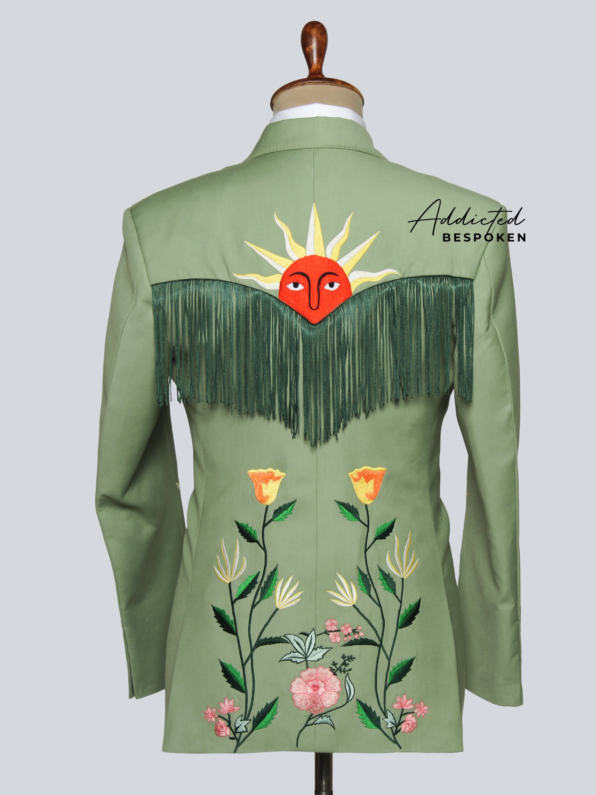 Sun Bloom Western Suit back view – embroidered men’s green suit with floral design and western-inspired tailoring