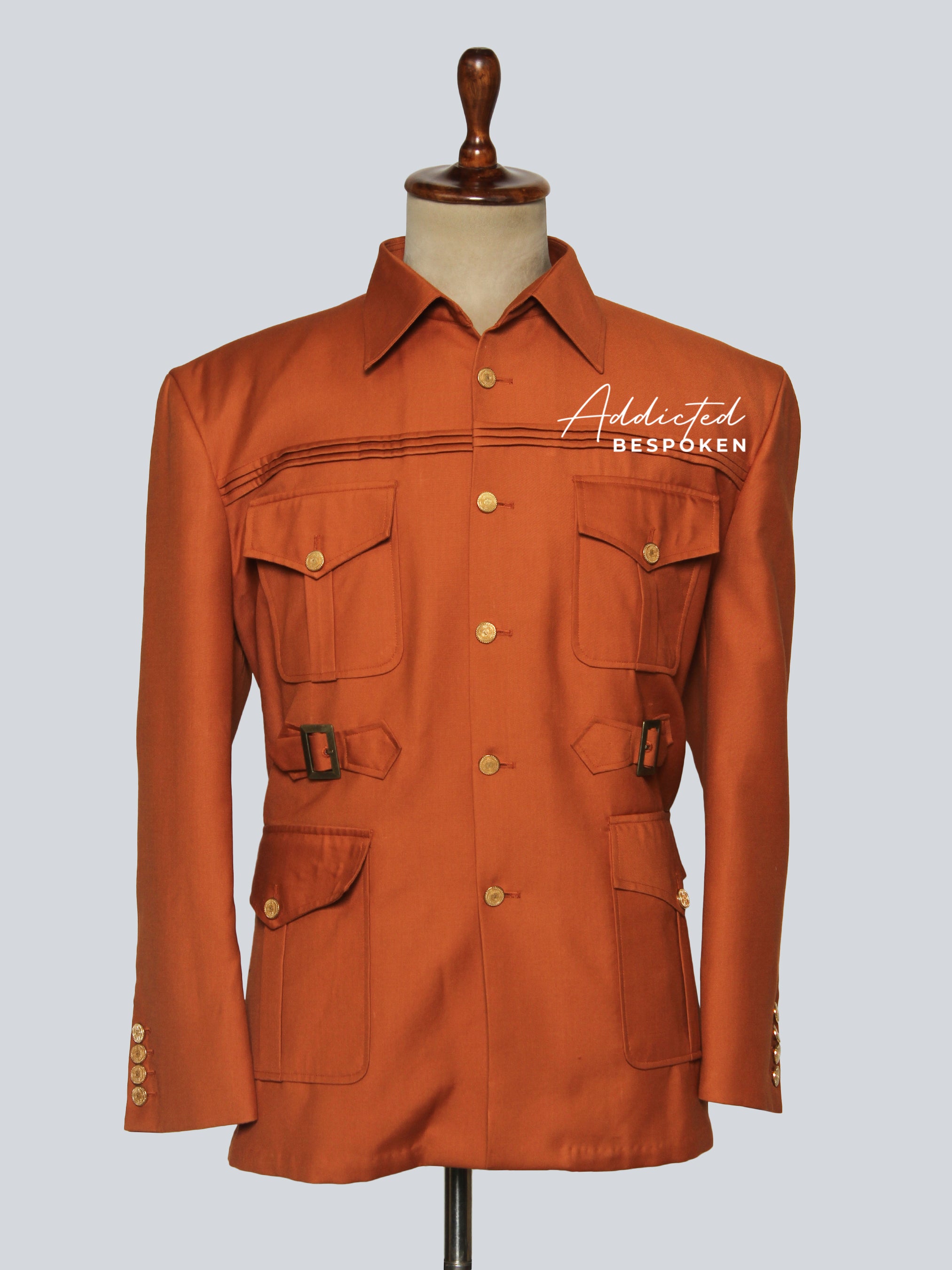 Rust brown safari jacket with flap pockets and button details – signature safari suit