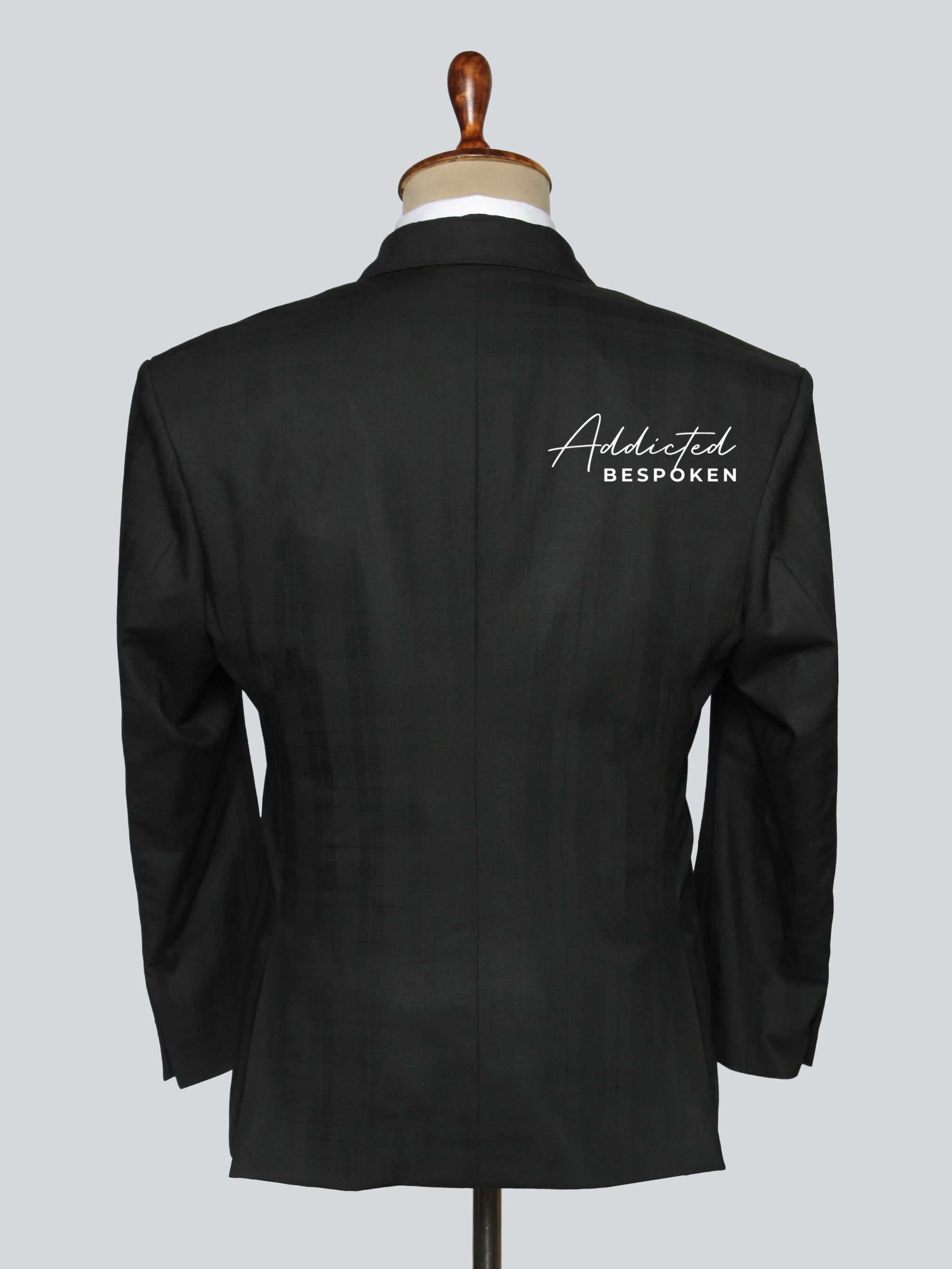 Back view of men’s tailored suit – premium fabric and sharp cut